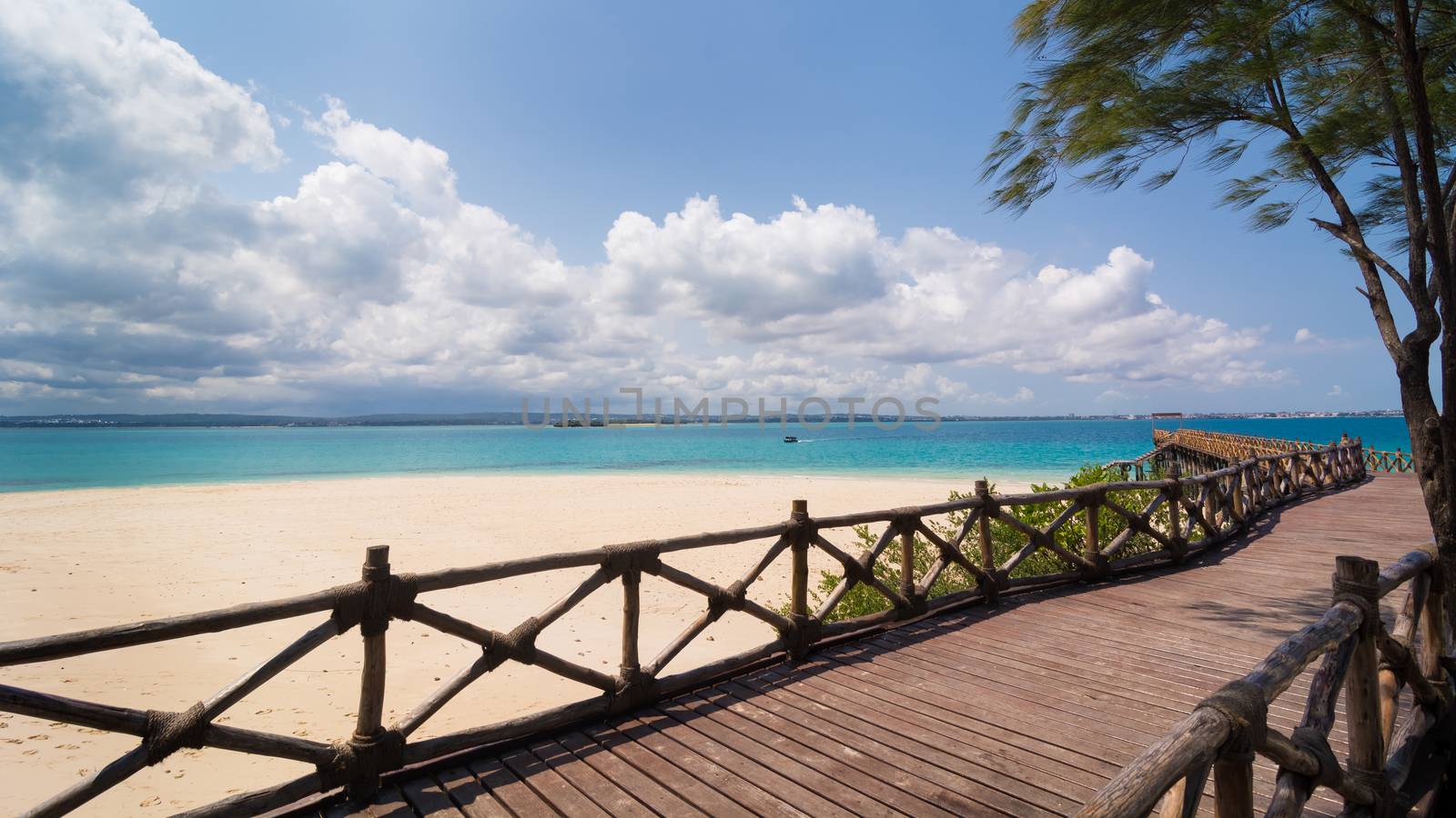 In the picture the beautiful wooden bridge leading to the beach on the island of slaves, Zanzibar Republic of Tanzania