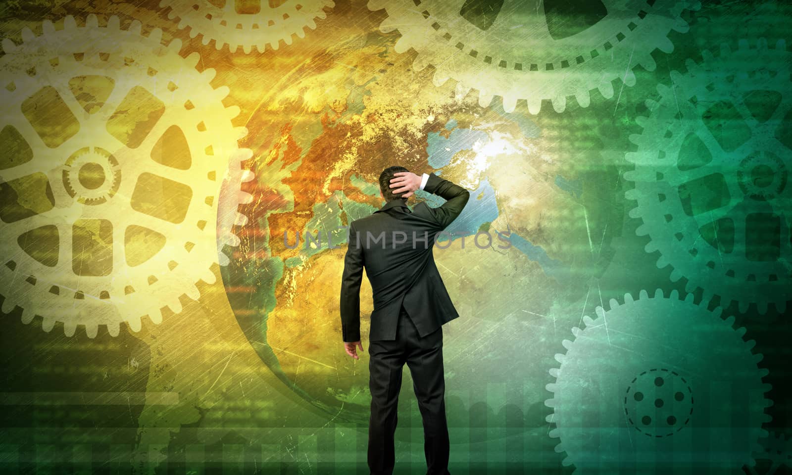 Businessman in front of holographic screen with earth globe. Elements of this image furnished by NASA