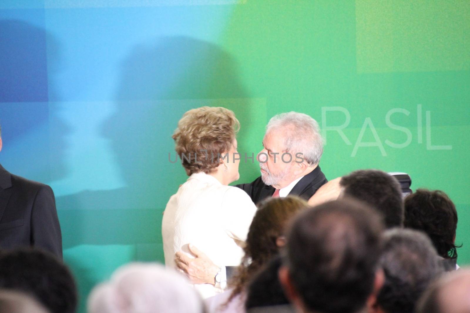 BRAZIL, Brasilia: President Dilma Rousseff embraces former President Luiz Inácio Lula da Silva on March 17, 2016 in Brasilia.The decision resulted in protests throughout the country, with some thinking that the appointment of the former president was an attempt to save him from charges in a corruption scandal.