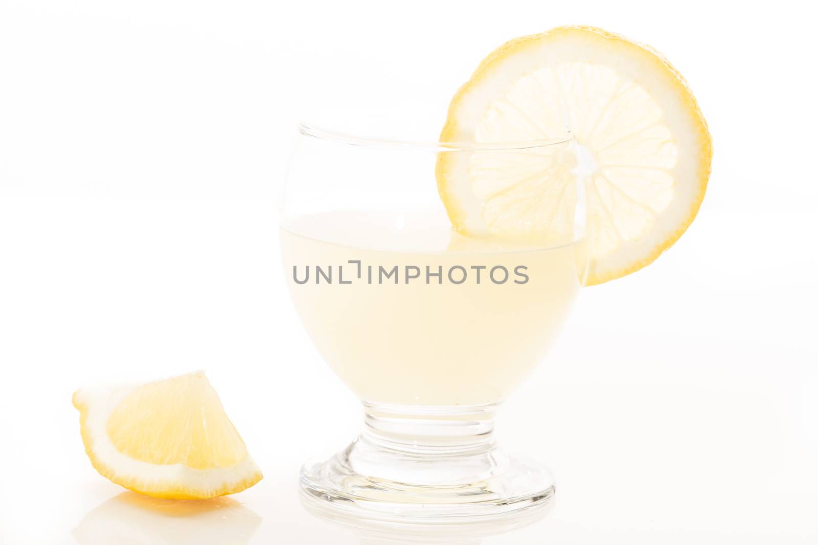Detox glass of lemon juice, diet liver stomach on white background France