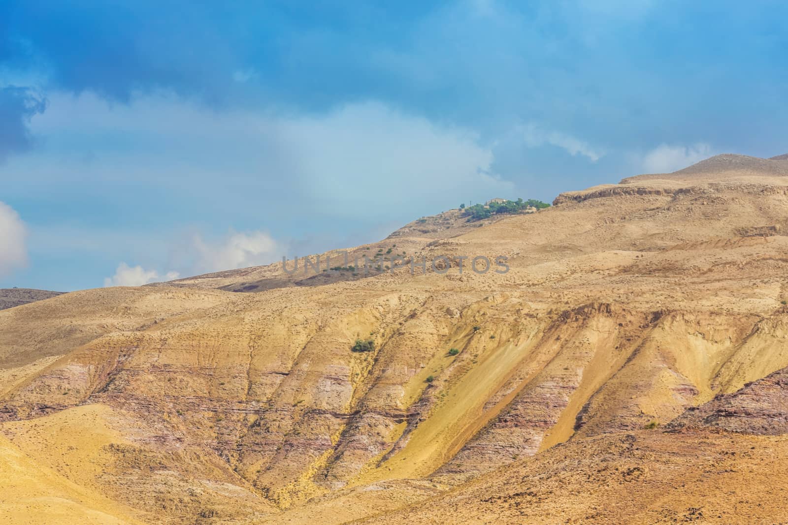 Sand and gravel hills and ravines in the mountain areas of Jordan. Desert mountain landscape