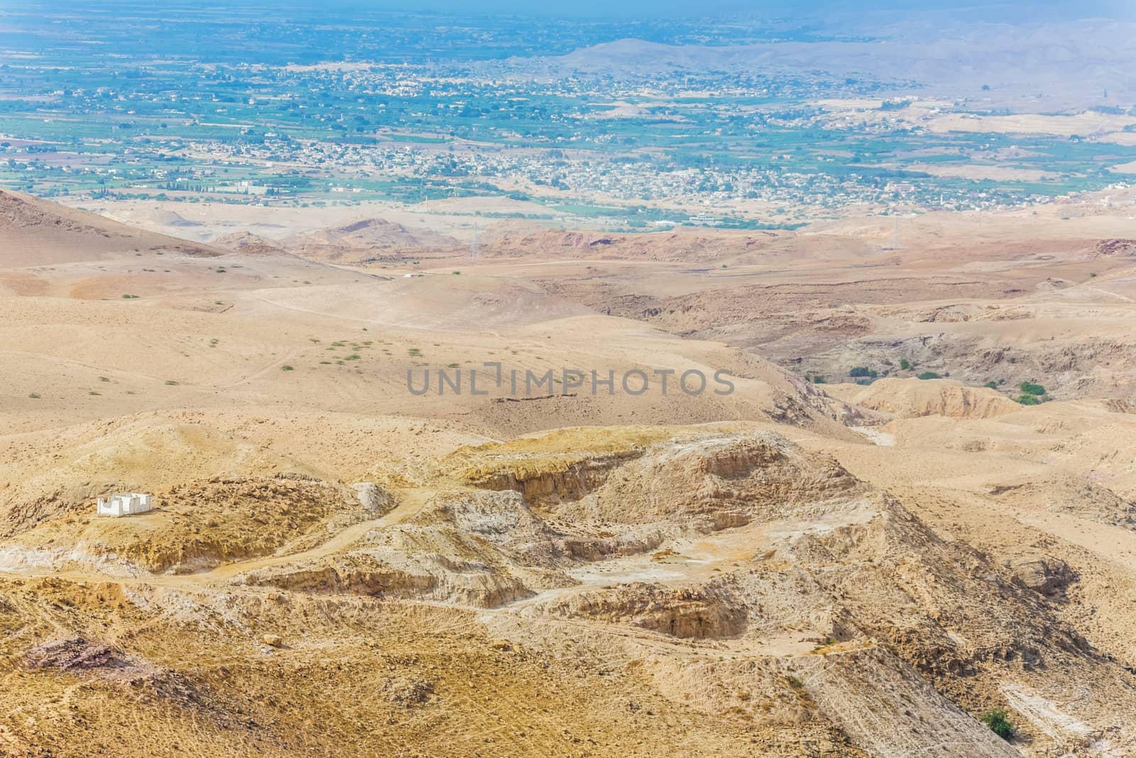 Sand and gravel hills and ravines in the mountain areas of Jordan. Desert mountain landscape