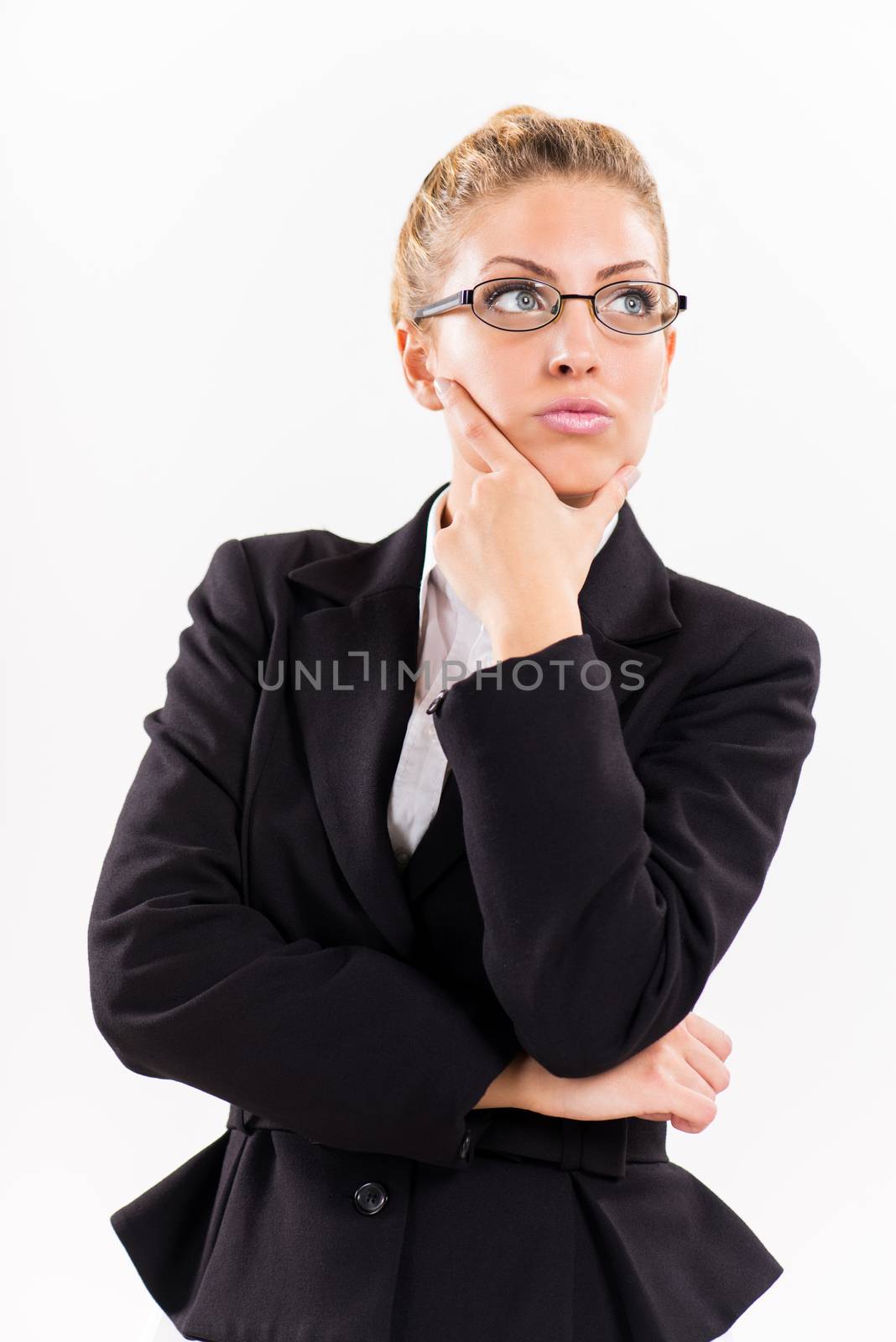Portrait of attractive businesswoman thinking.