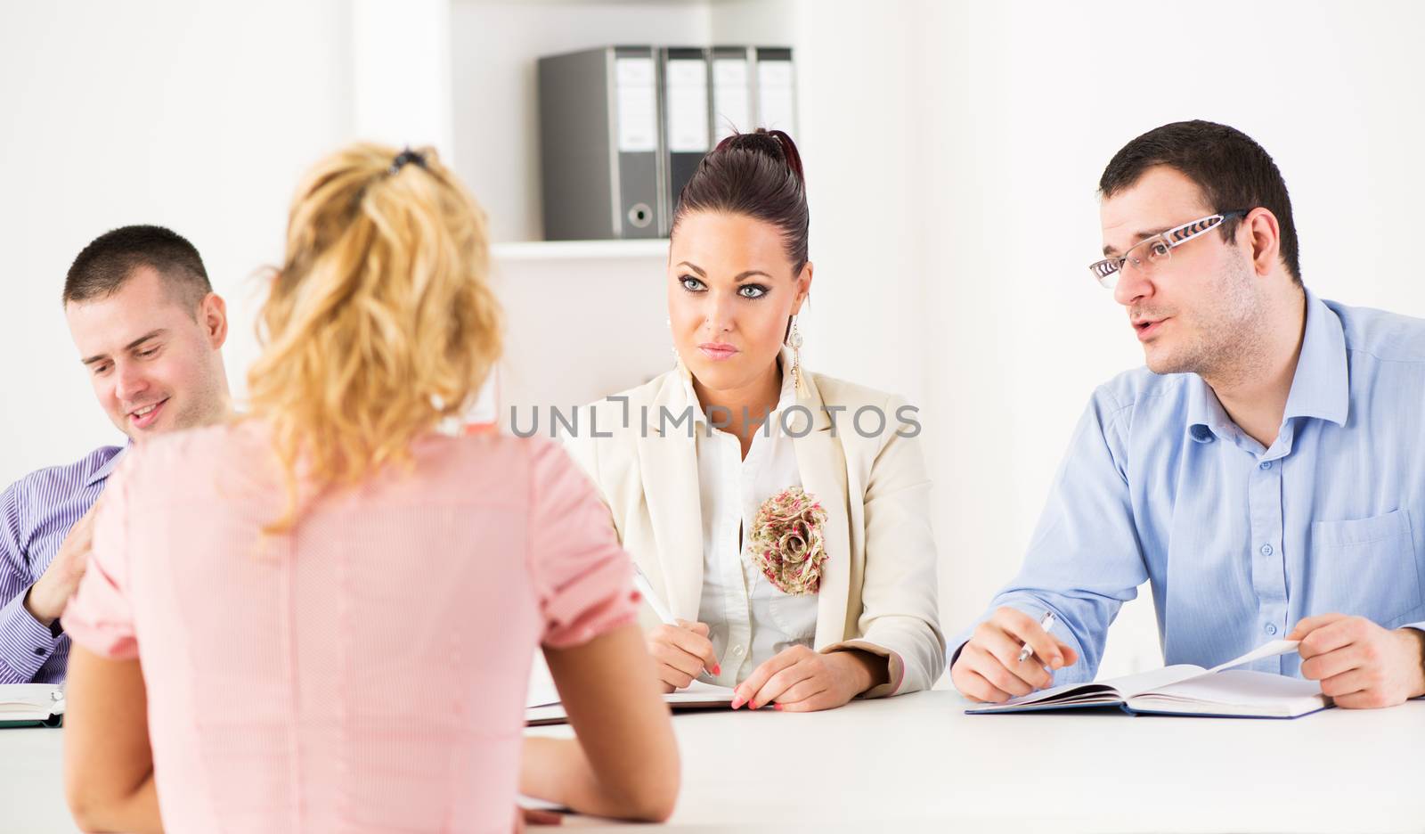 Businesswoman in front of the commission having a job interview.