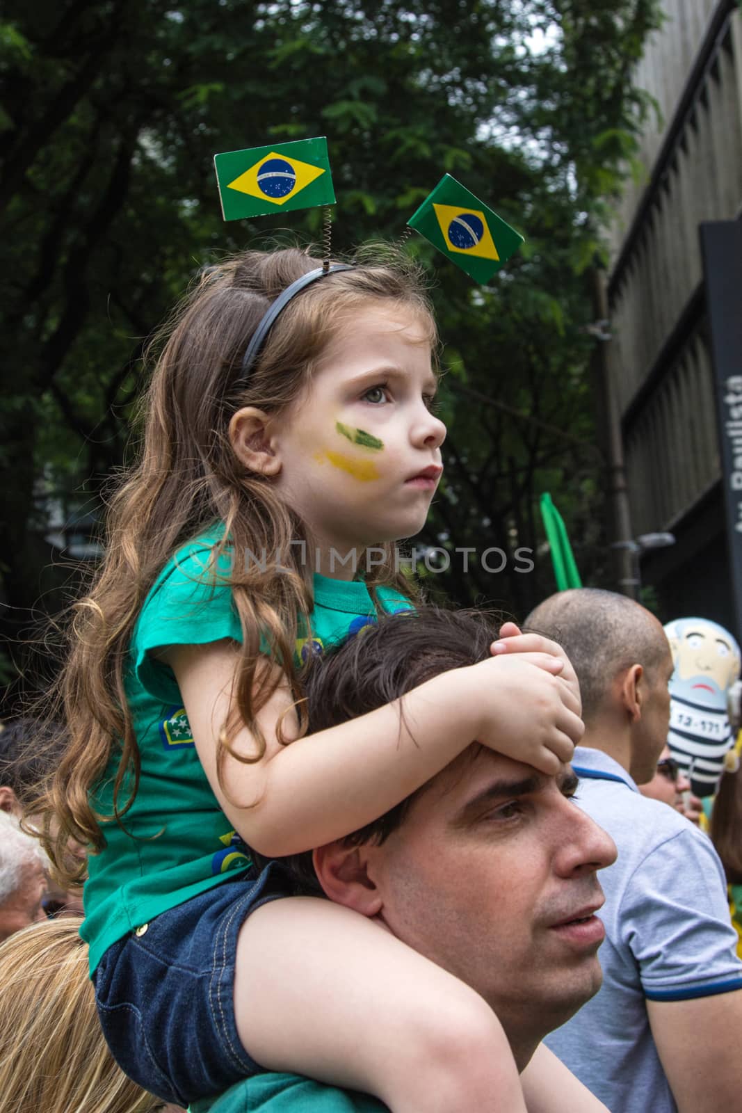 Sao Paulo Brazil March 13, 2016: One unidentified girl with one unidentified man in the biggest protest against federal government corruption in Sao Paulo.
