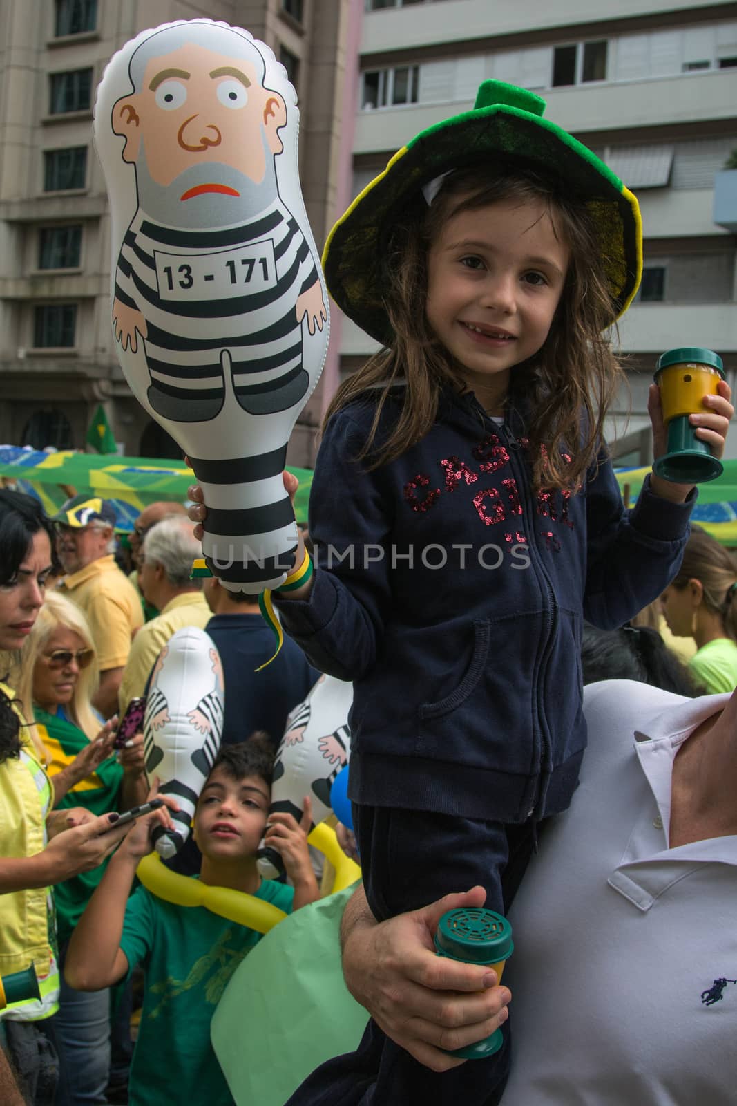 Sao Paulo Brazil March 13, 2016: One unidentified girl in the biggest protest against federal government corruption in Sao Paulo. Protesters call for the impeachment of President Dilma Rousseff.