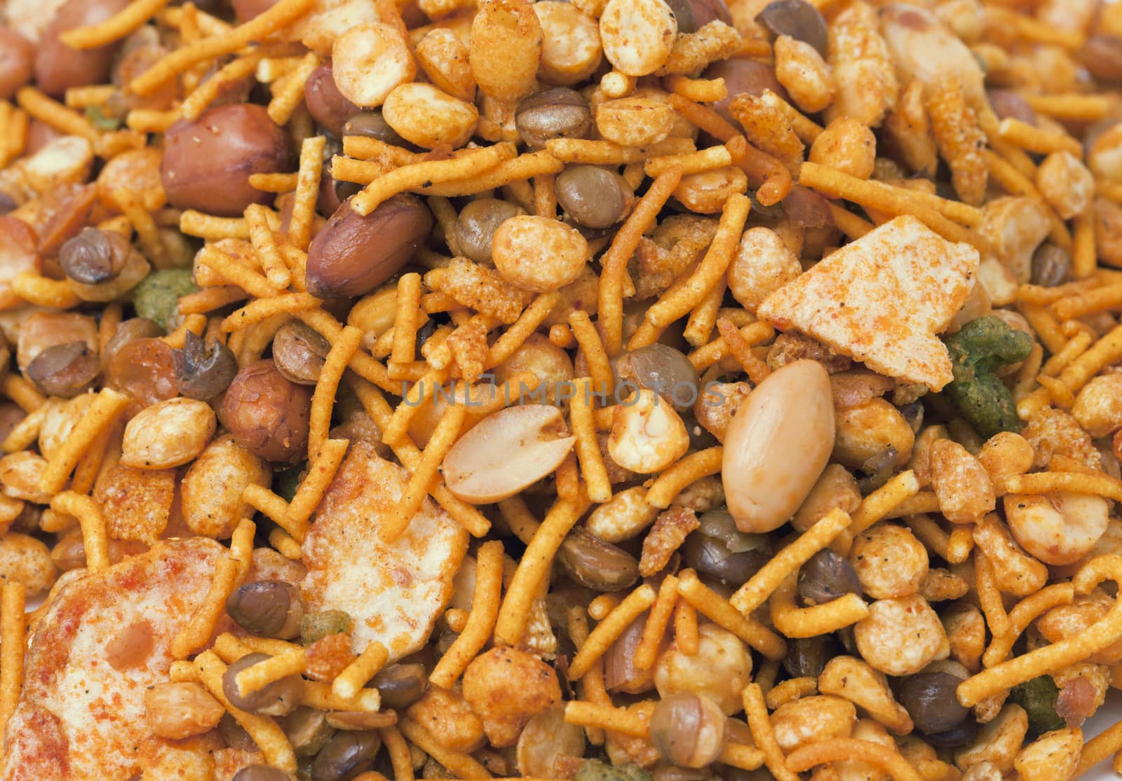Dry roasted Indian snack mix, close-up background