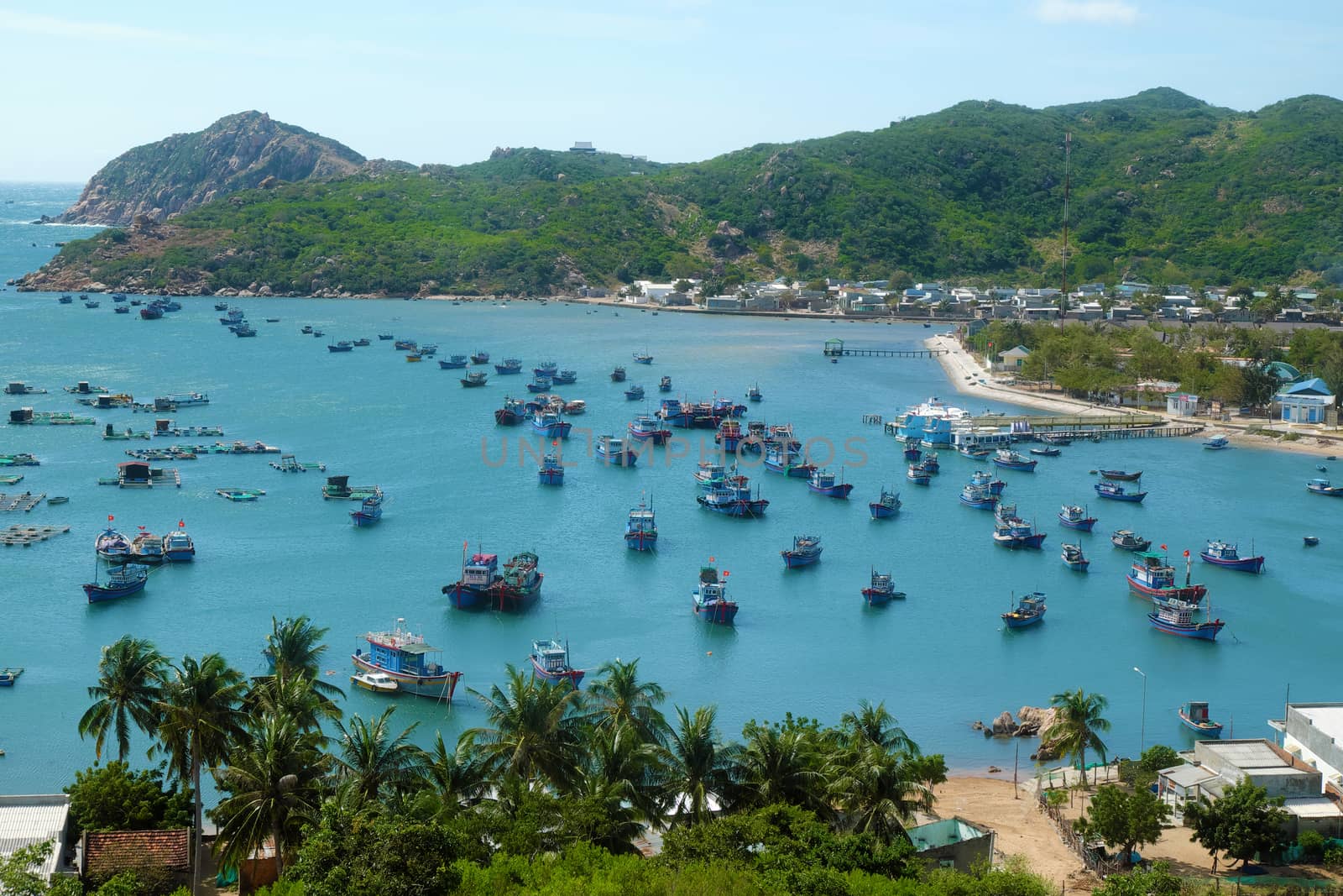 Beautiful panoramic landscape of Vietnam beach, Vinh Hy bay, Ninh Thuan, group of boat anchor at fishing village,  fantastic holiday when travel at Viet Nam in summer or spring