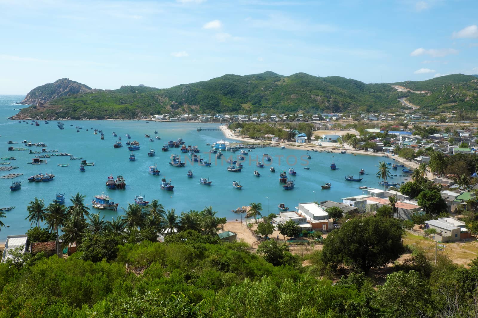 Beautiful panoramic landscape of Vietnam beach, Vinh Hy bay, Ninh Thuan, group of boat anchor at fishing village,  fantastic holiday when travel at Viet Nam in summer or spring