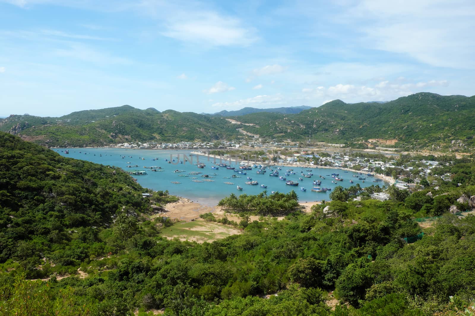 Beautiful panoramic landscape of Vietnam beach, Vinh Hy bay, Ninh Thuan, group of boat anchor at fishing village,  fantastic holiday when travel at Viet Nam in summer or spring