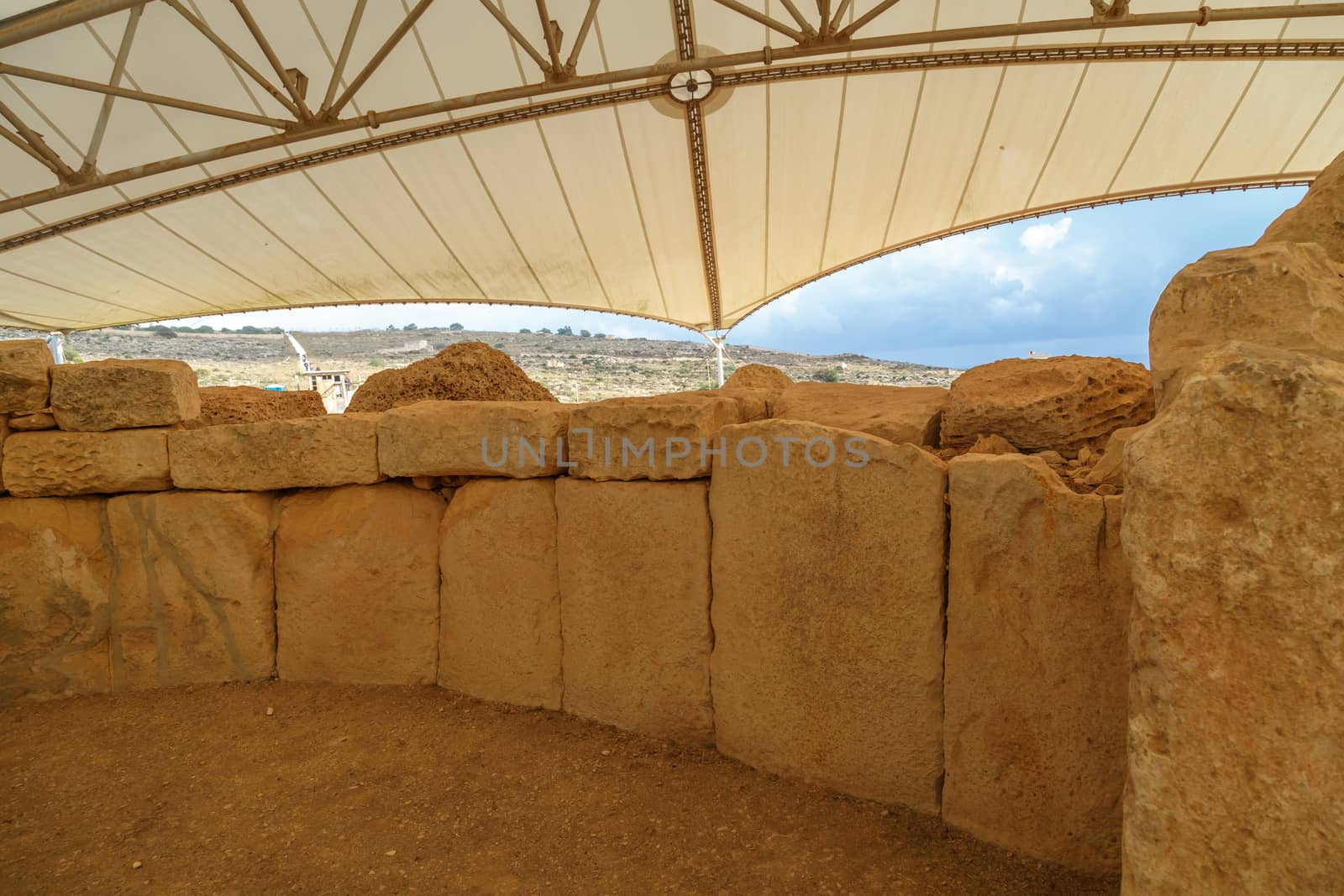 Detailed view of ancient limestone structures of Hagar Qim and Gnajdra Temples in Qrendi, Malta.