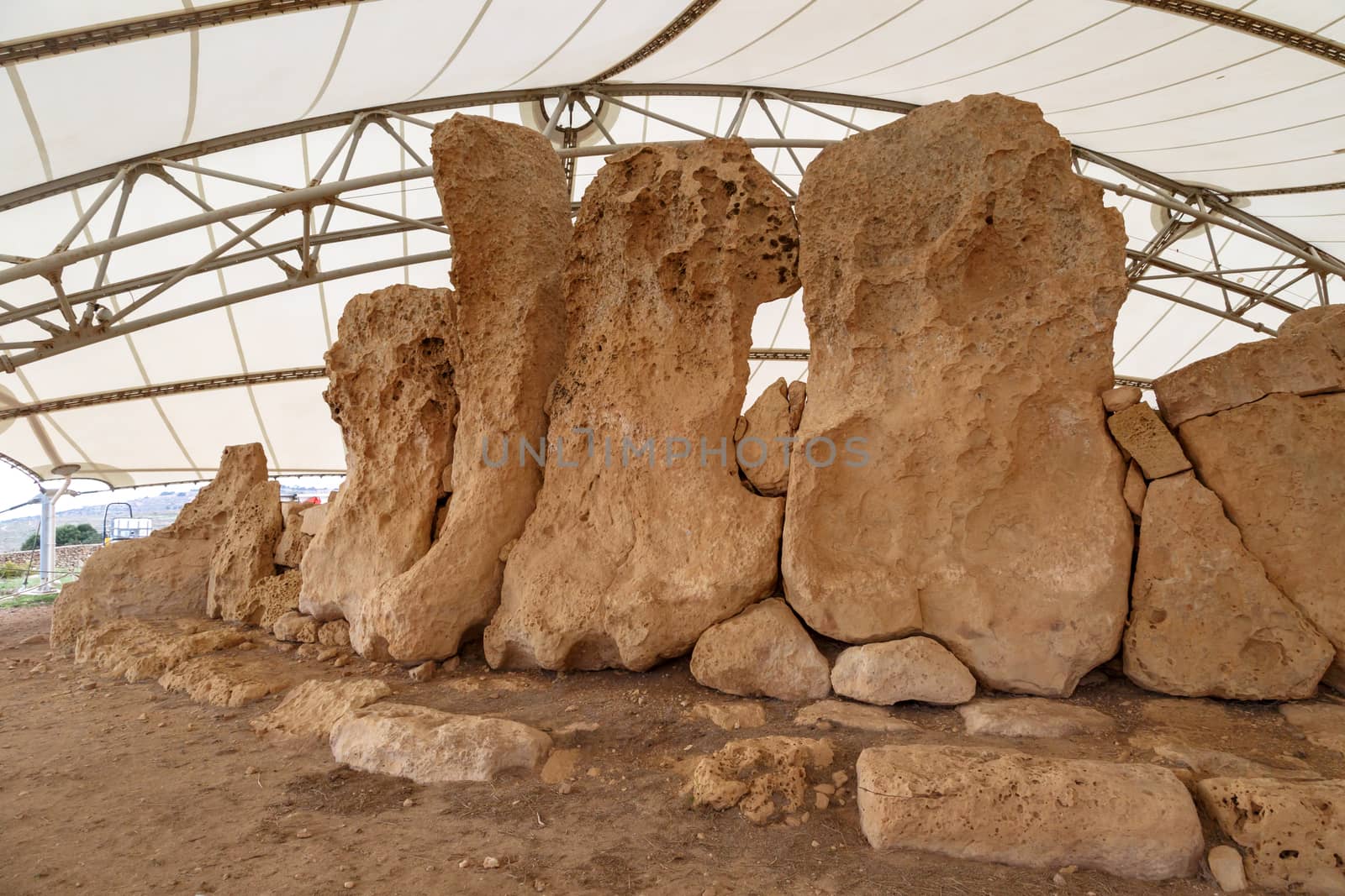 Detailed view of ancient limestone structures of Hagar Qim and Gnajdra Temples in Qrendi, Malta.