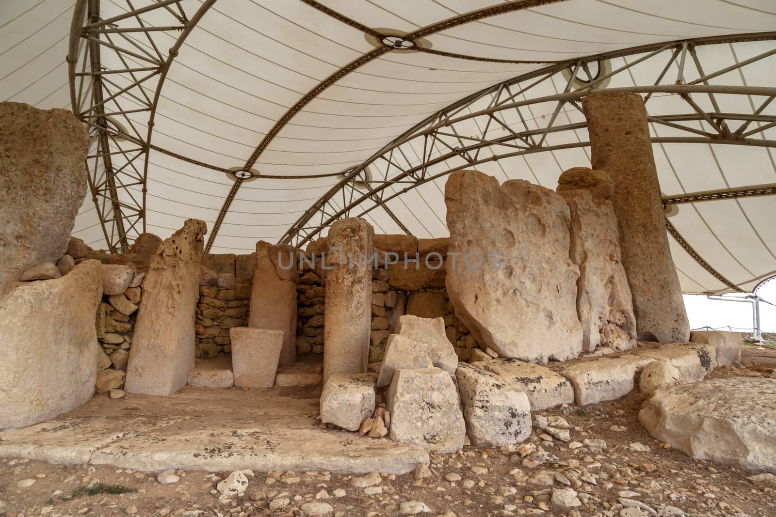 Detailed view of ancient limestone structures of Hagar Qim and Gnajdra Temples in Qrendi, Malta.