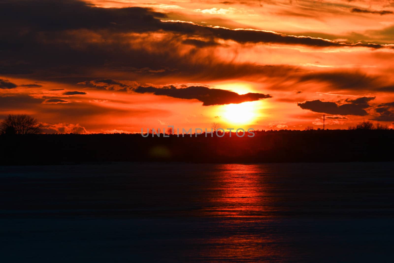 Sunset Over a Frozen Lake