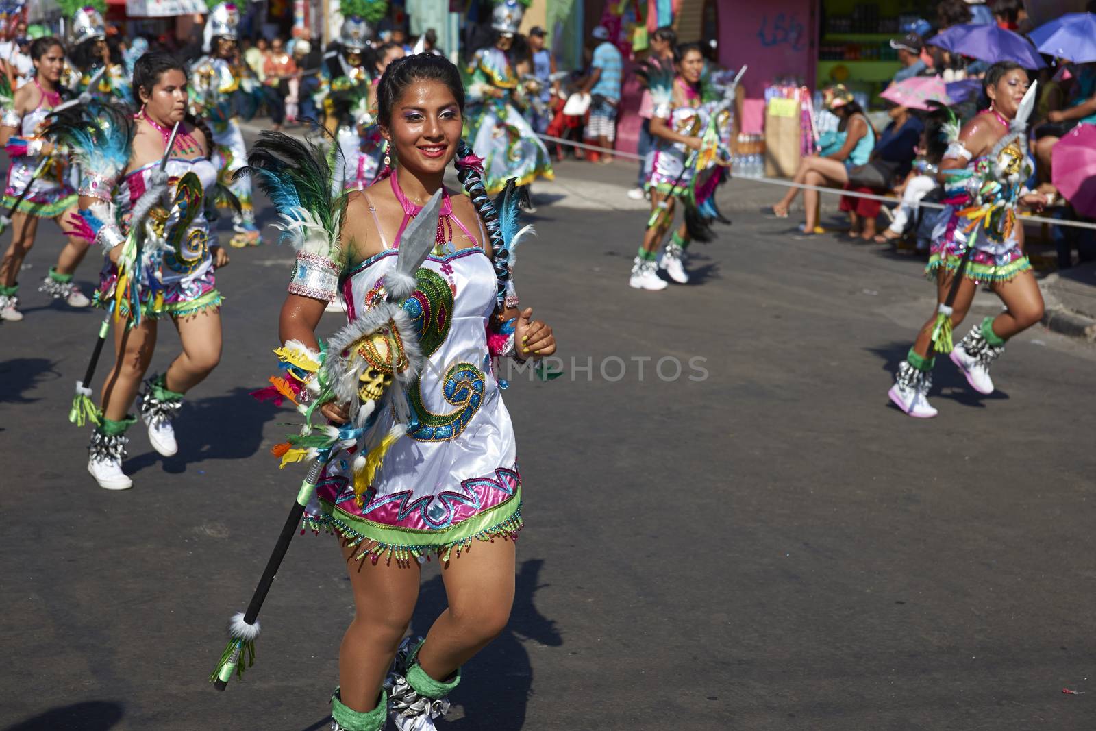 Young woman performing in a Tobas dance group at the Carnaval Andino con la Fuerza del Sol in Arica, Chile. The dance originates in Oruro, Bolivia.