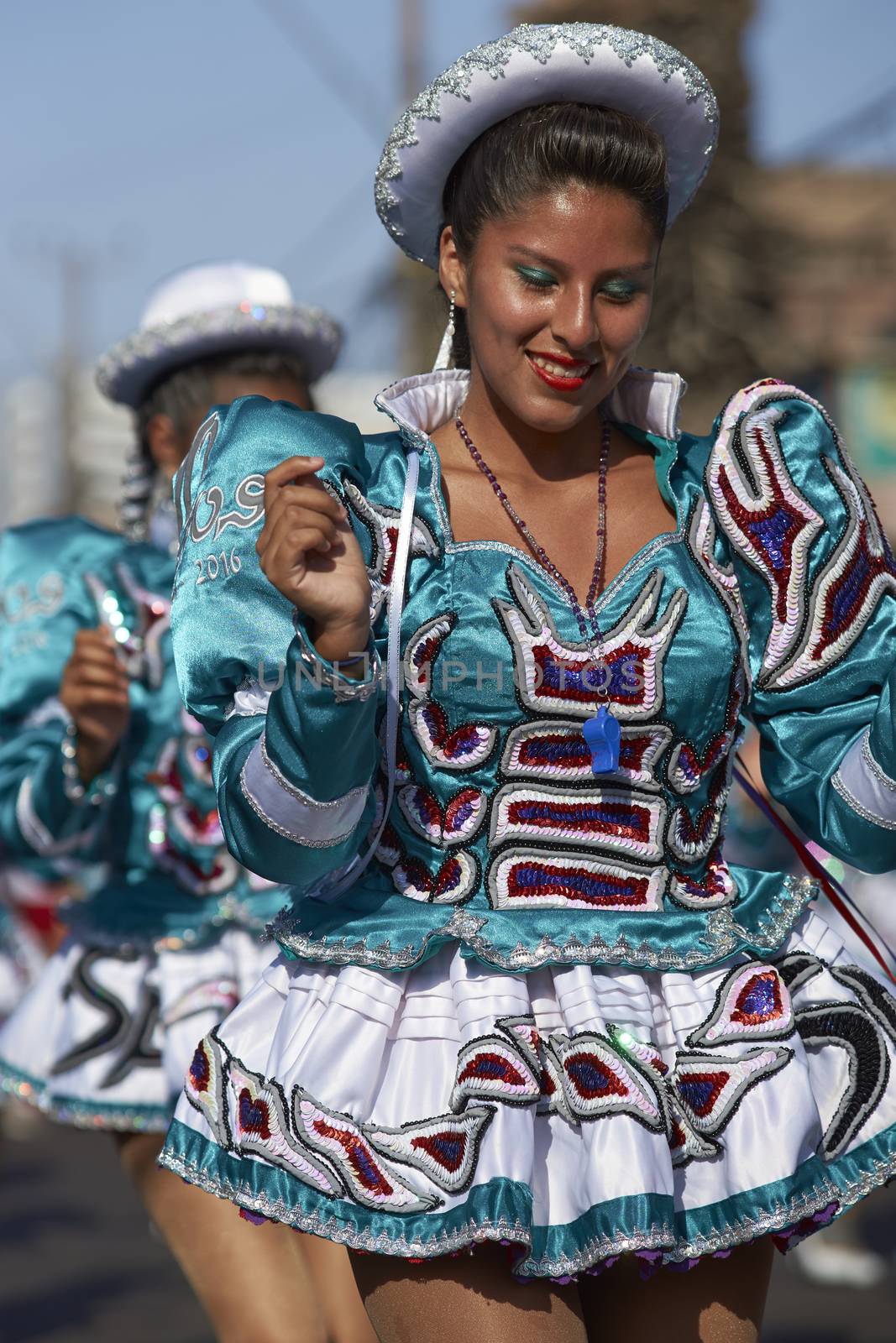 Caporales dance group performing at the annual Carnaval Andino con la Fuerza del Sol in Arica, Chile.