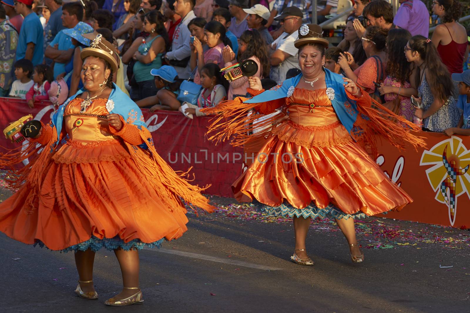 Morenada dancers in traditional Andean costume performing at the annual Carnaval Andino con la Fuerza del Sol in Arica, Chile.