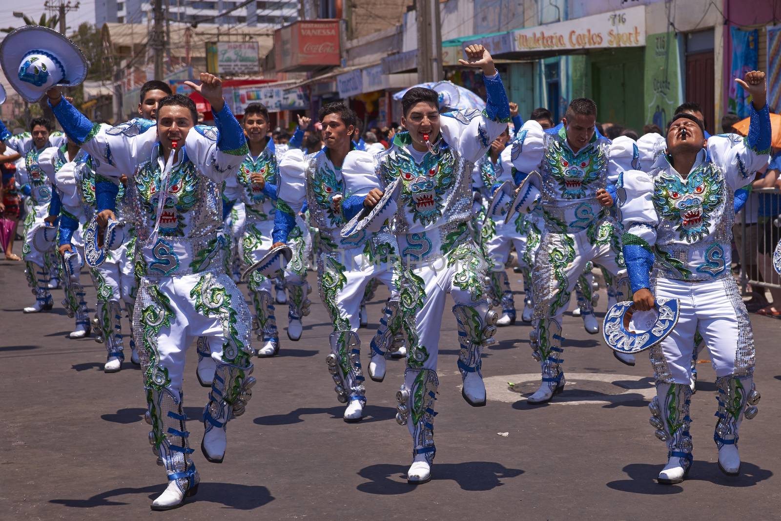 Caporales dance group performing at the annual Carnaval Andino con la Fuerza del Sol in Arica, Chile.