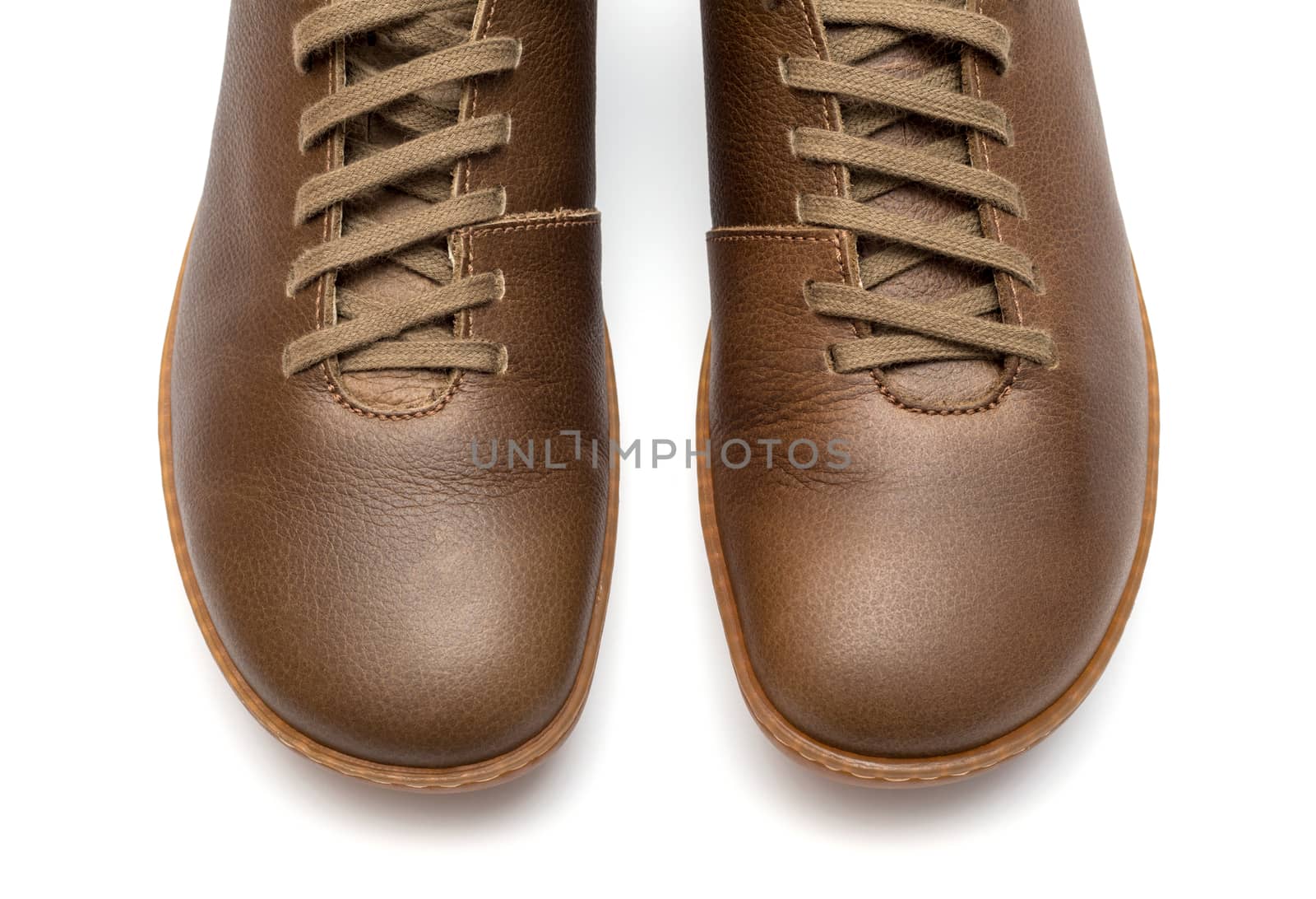 Brown Leather Men Shoes isolated on white background by DNKSTUDIO