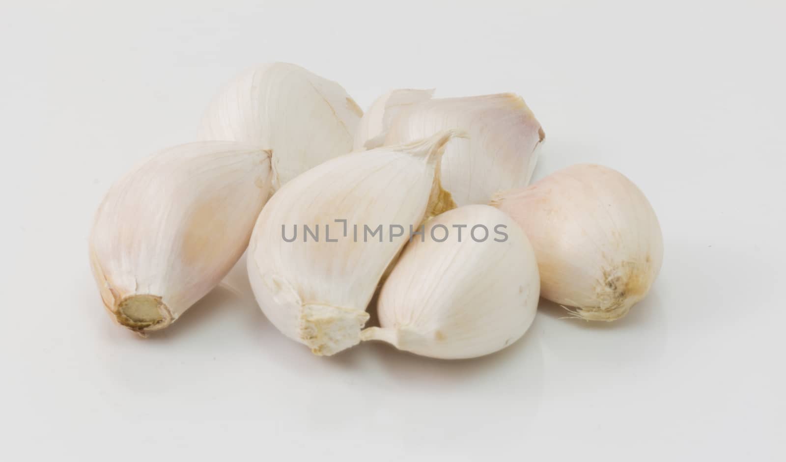 Fresh white garlic isolated on white background