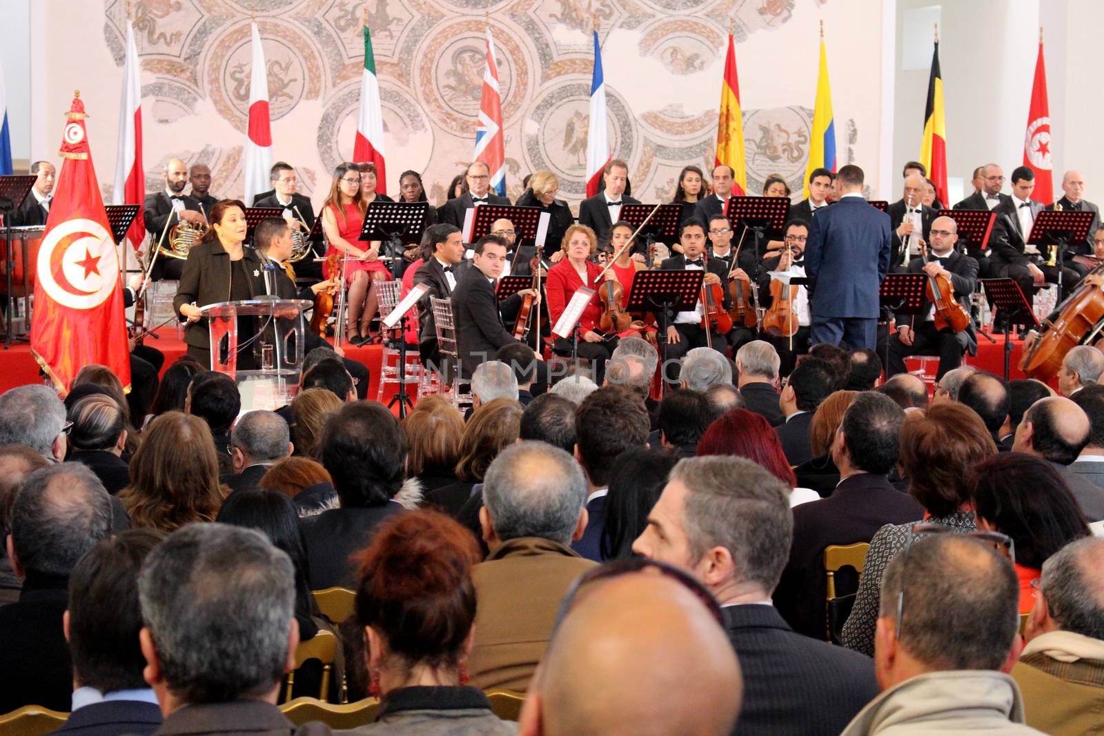 TUNISIA, Tunis : The Tunisian Symphony Orchestra performs during a memorial ceremony at the Bardo museum in Tunis on March 18, 2016, marking the first anniversary of a jihadist attack on the museum.