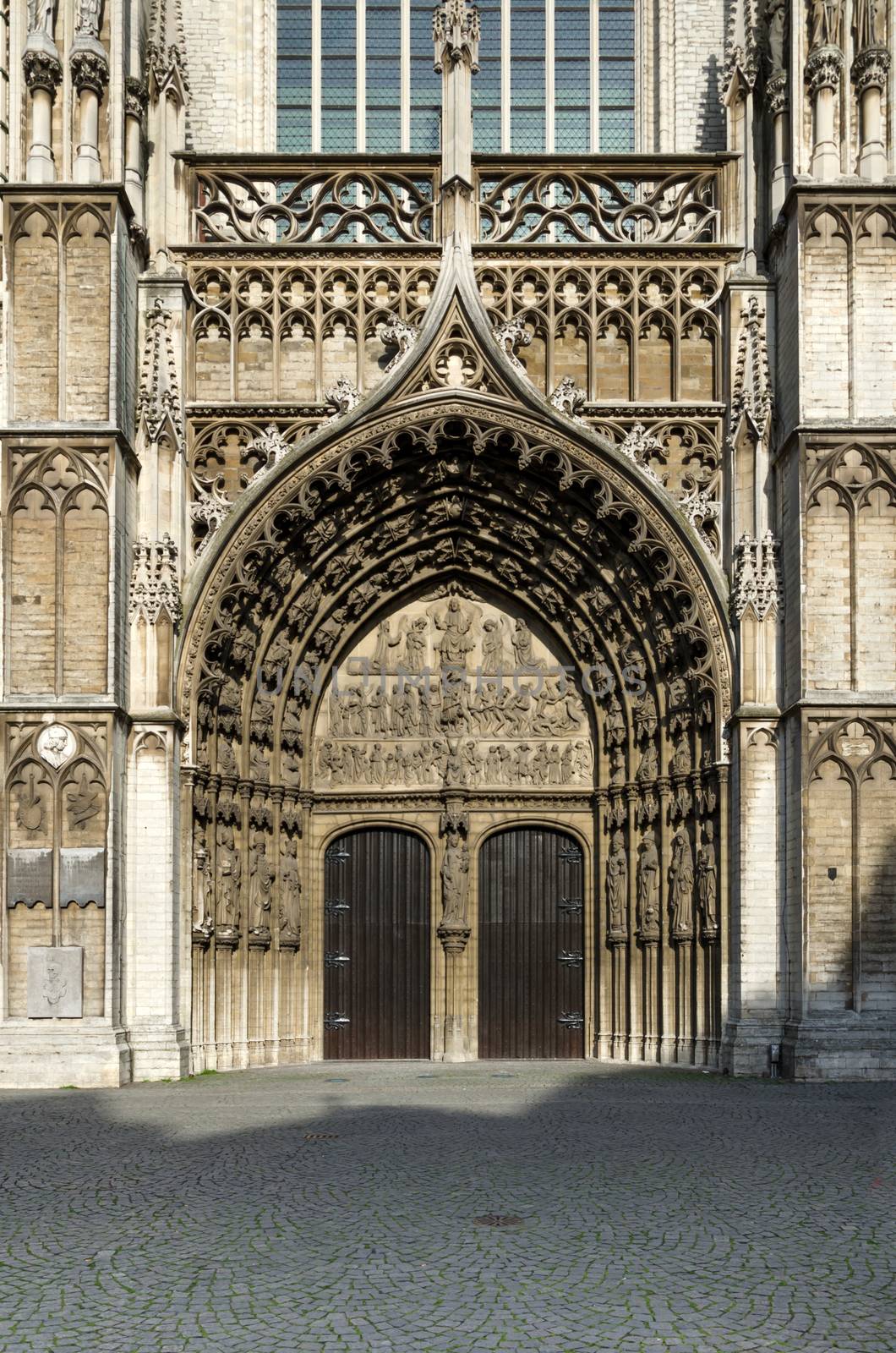 Main portal at the cathedral of Our Lady in Antwerp by siraanamwong