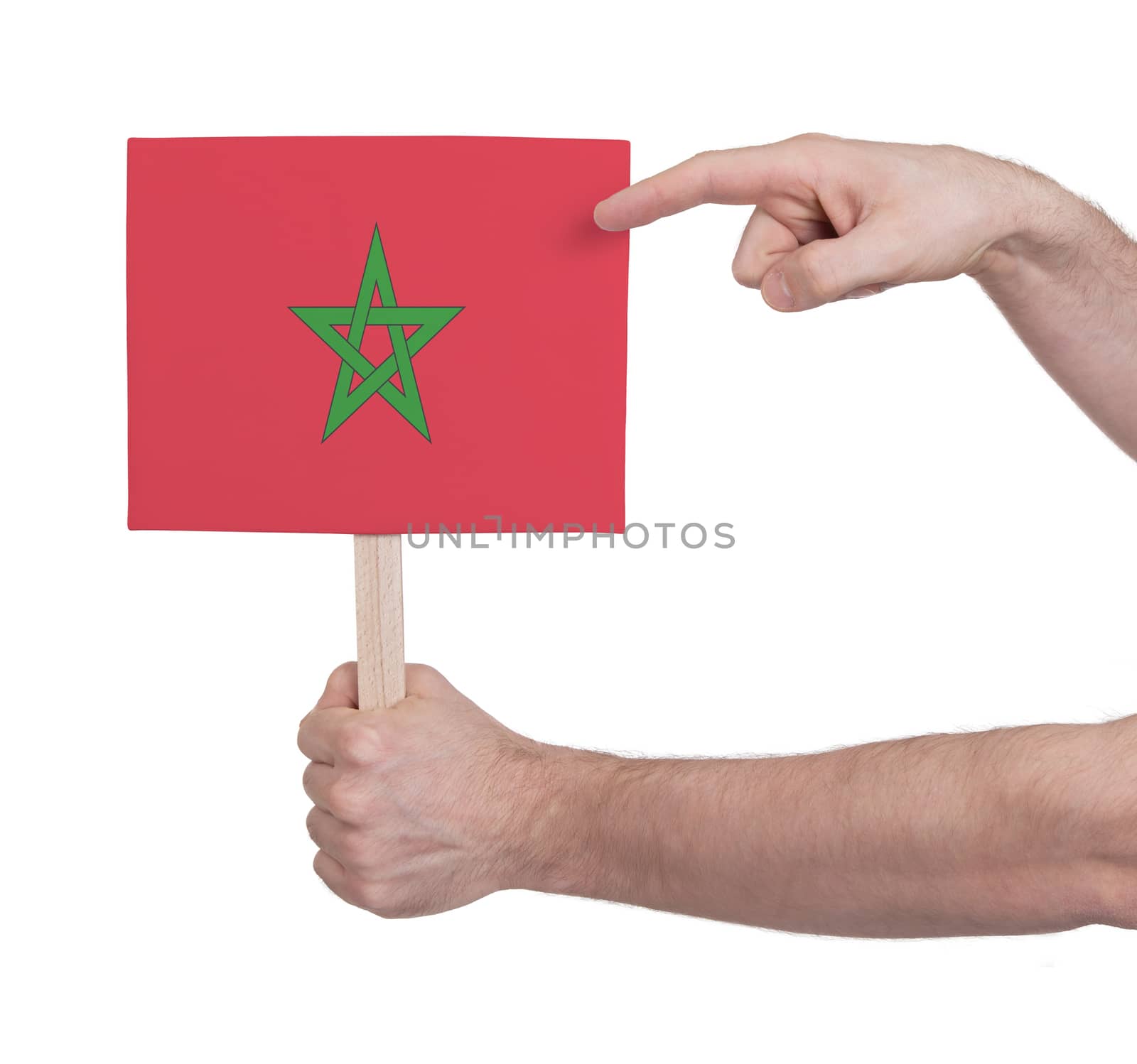 Hand holding small card, isolated on white - Flag of Morocco