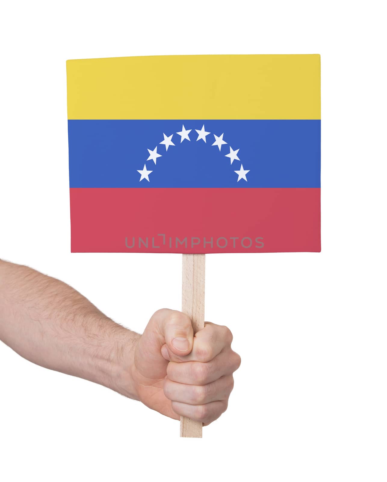 Hand holding small card - Flag of Venezuela by michaklootwijk