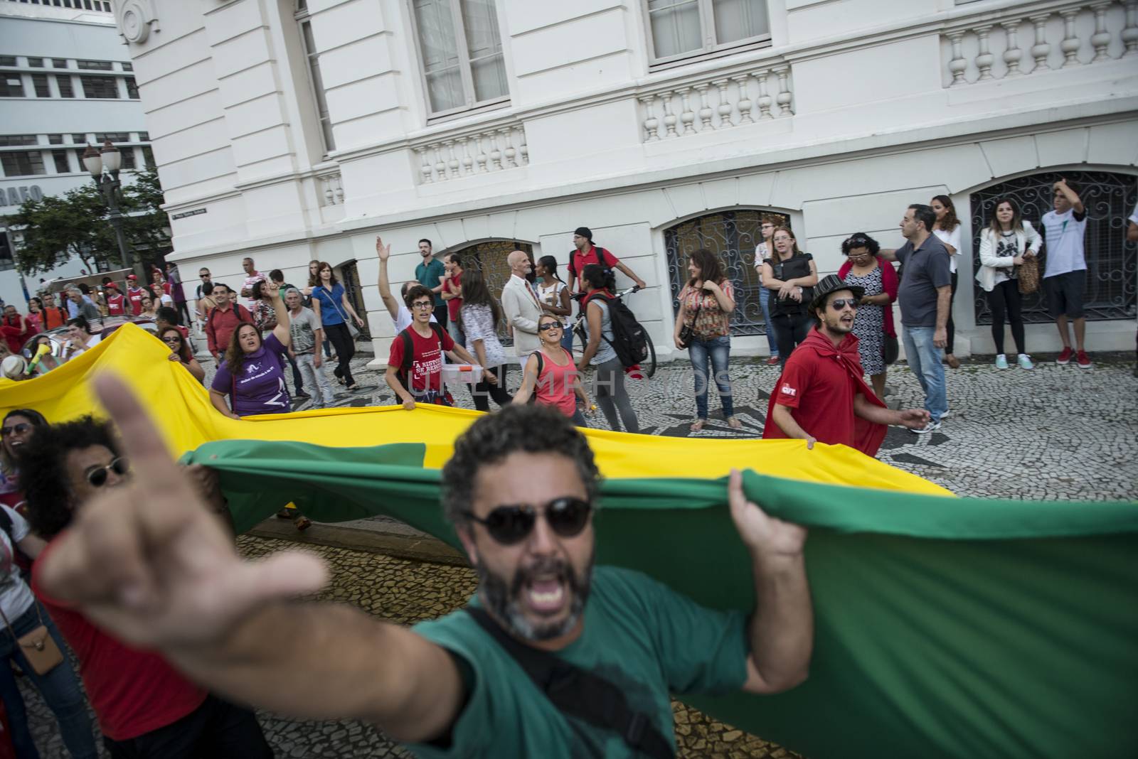 BRAZIL, Curitiba: A pro-government protester demonstrates in support of President Dilma Rousseff and former President Luiz Inacio Lula da Silva in Curitiba, Brazil, on March 18, 2016. Brazilian President Dilma Rousseff's supporters took to the streets Friday to fight back at attempts to oust her, as a flurry of court battles raged over her controversial cabinet appointment of predecessor Luiz Inacio Lula da Silva. 