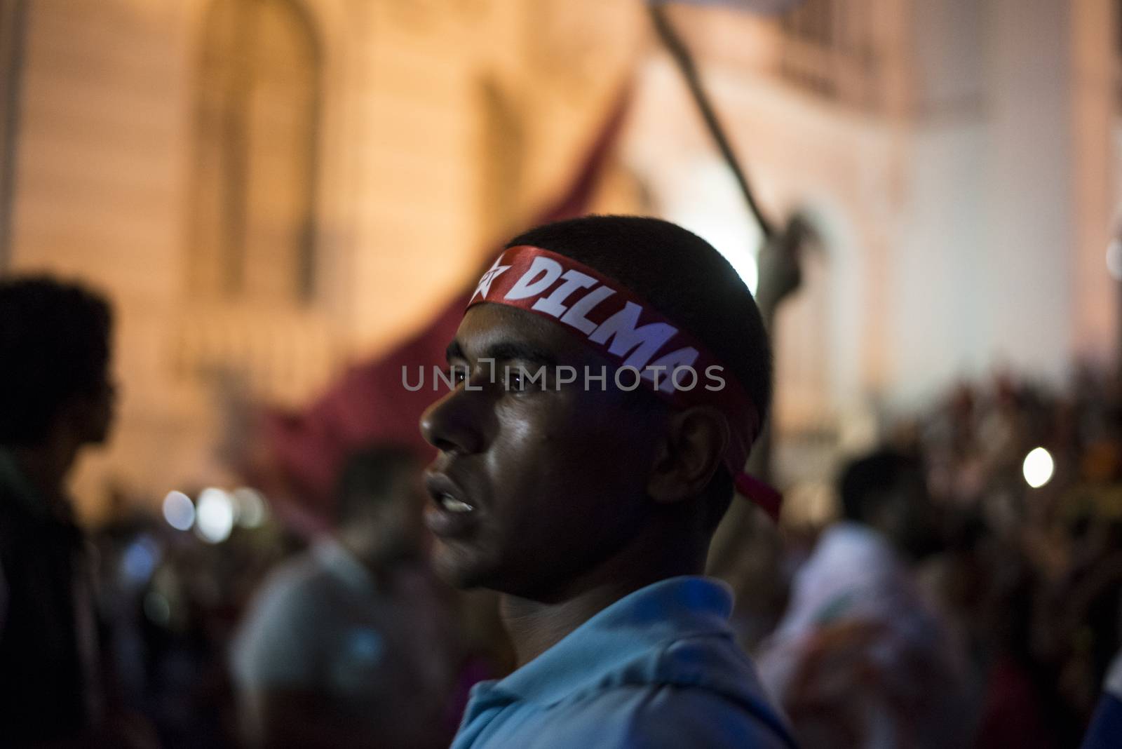 BRAZIL, Curitiba: A pro-government protester wears a headband reading Dilma during a demonstration in support of President Dilma Rousseff and former President Luiz Inacio Lula da Silva in Curitiba, Brazil, on March 18, 2016. Brazilian President Dilma Rousseff's supporters took to the streets Friday to fight back at attempts to oust her, as a flurry of court battles raged over her controversial cabinet appointment of predecessor Luiz Inacio Lula da Silva. 