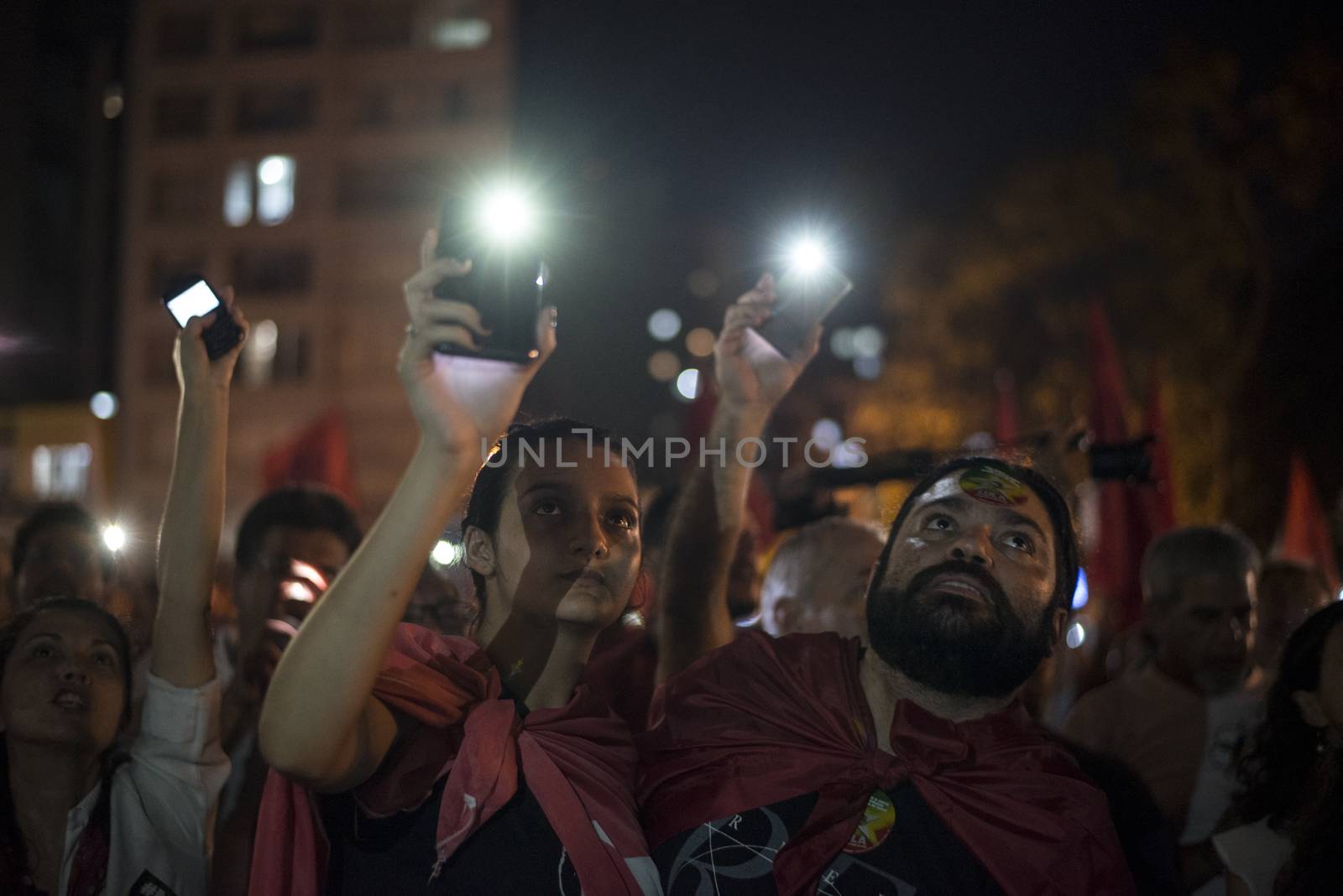BRAZIL, Curitiba: A group of pro-government protesters demonstrate in support of President Dilma Rousseff and former President Luiz Inacio Lula da Silva in Curitiba, Brazil, on March 18, 2016. Brazilian President Dilma Rousseff's supporters took to the streets Friday to fight back at attempts to oust her, as a flurry of court battles raged over her controversial cabinet appointment of predecessor Luiz Inacio Lula da Silva. 