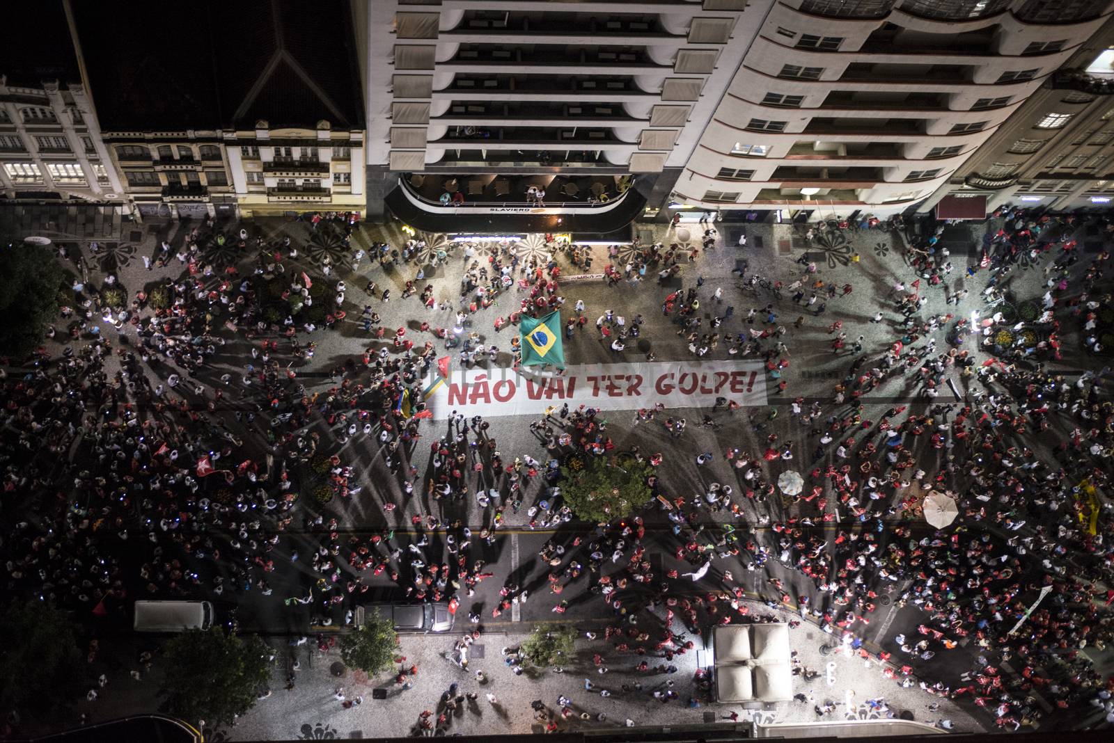 BRAZIL, Curitiba: A group of pro-government protesters demonstrate in support of President Dilma Rousseff and former President Luiz Inacio Lula da Silva in Curitiba, Brazil, on March 18, 2016. Brazilian President Dilma Rousseff's supporters took to the streets Friday to fight back at attempts to oust her, as a flurry of court battles raged over her controversial cabinet appointment of predecessor Luiz Inacio Lula da Silva. 