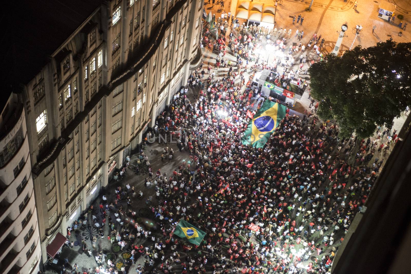 BRAZIL, Curitiba: A group of pro-government protesters demonstrate in support of President Dilma Rousseff and former President Luiz Inacio Lula da Silva in Curitiba, Brazil, on March 18, 2016. Brazilian President Dilma Rousseff's supporters took to the streets Friday to fight back at attempts to oust her, as a flurry of court battles raged over her controversial cabinet appointment of predecessor Luiz Inacio Lula da Silva. 