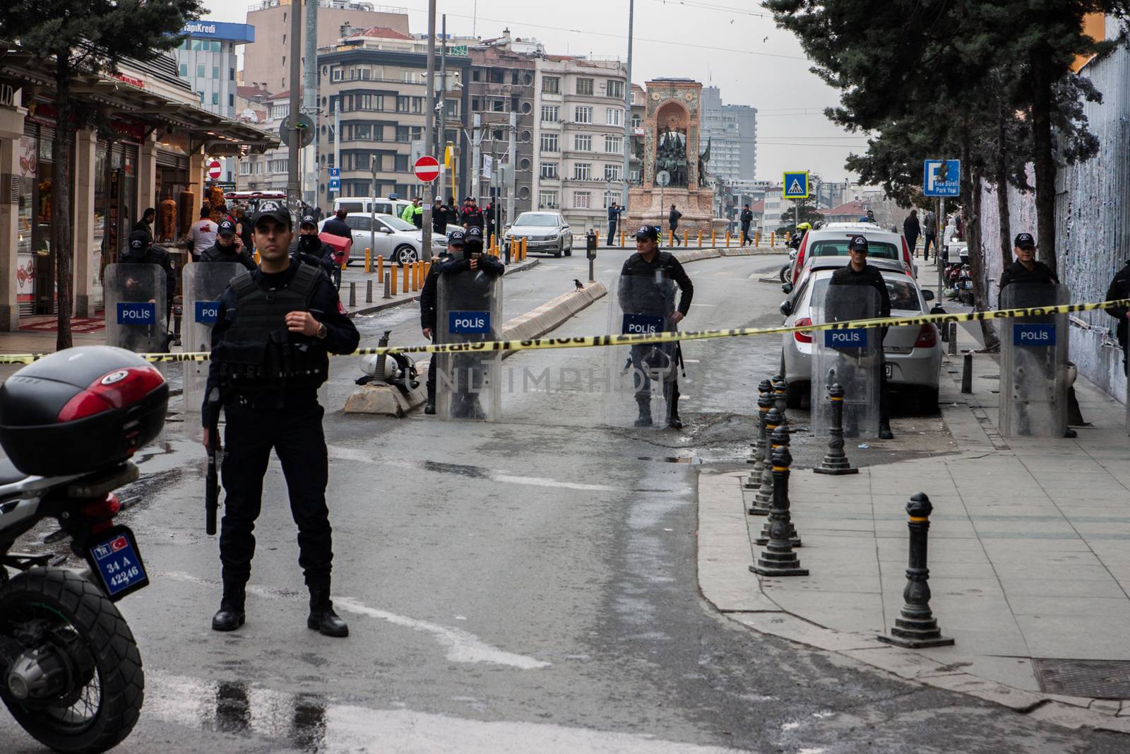 TURKEY, Istanbul: Police secure the area following a suicide bombing in a major shopping and tourist district at Istiklal street in the central part of the city on March 19, 2016 in Istanbul, Turkey. The explosion killed at least five people and left many injured.