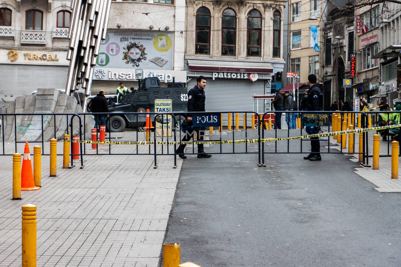 TURKEY, Istanbul: Police secure the area following a suicide bombing in a major shopping and tourist district at Istiklal street in the central part of the city on March 19, 2016 in Istanbul, Turkey. The explosion killed at least five people and left many injured.