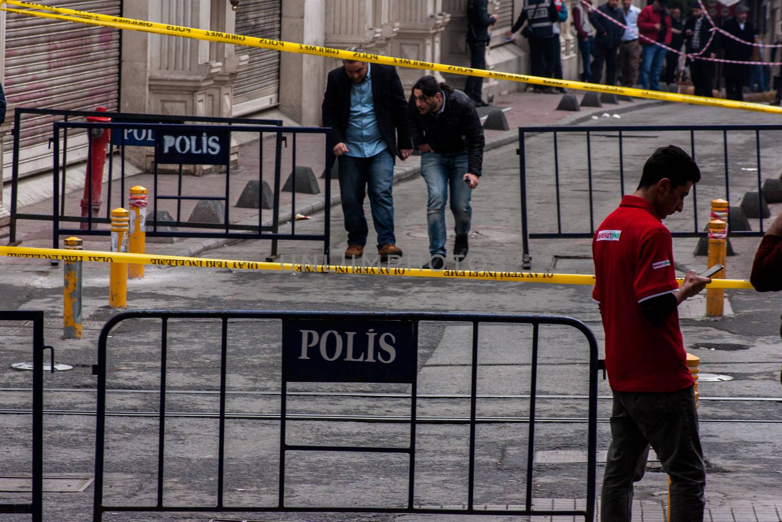 TURKEY, Istanbul: Police secure the area following a suicide bombing in a major shopping and tourist district at Istiklal street in the central part of the city on March 19, 2016 in Istanbul, Turkey. The explosion killed at least five people and left many injured.