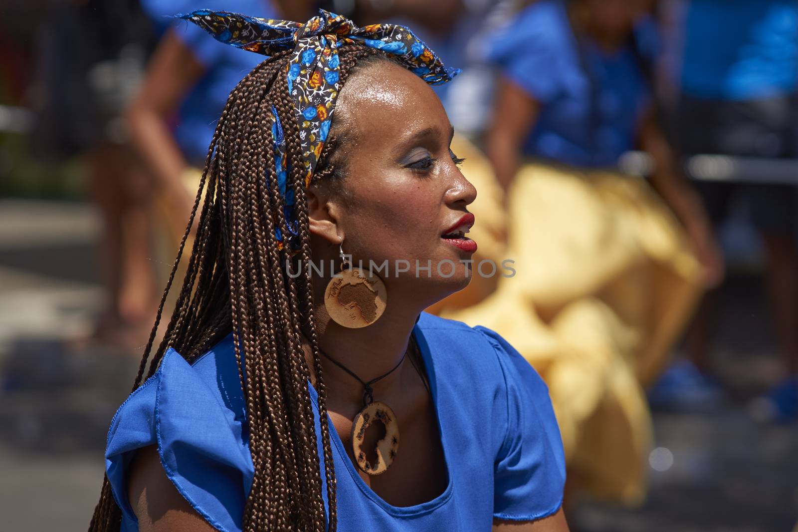 Group of dancers of Africa descent (Afrodescendiente) performing at the annual Carnaval Andino con la Fuerza del Sol in Arica, Chile.