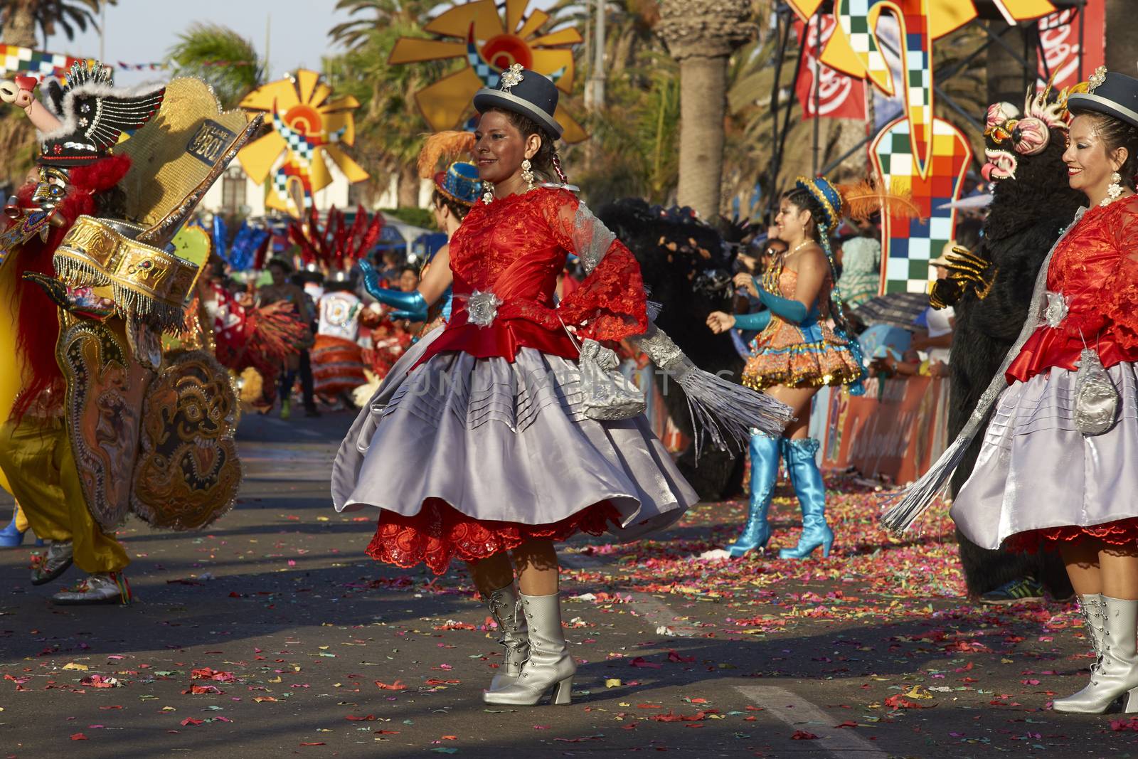 Morenada dancers in traditional Andean costume performing at the annual Carnaval Andino con la Fuerza del Sol in Arica, Chile.
