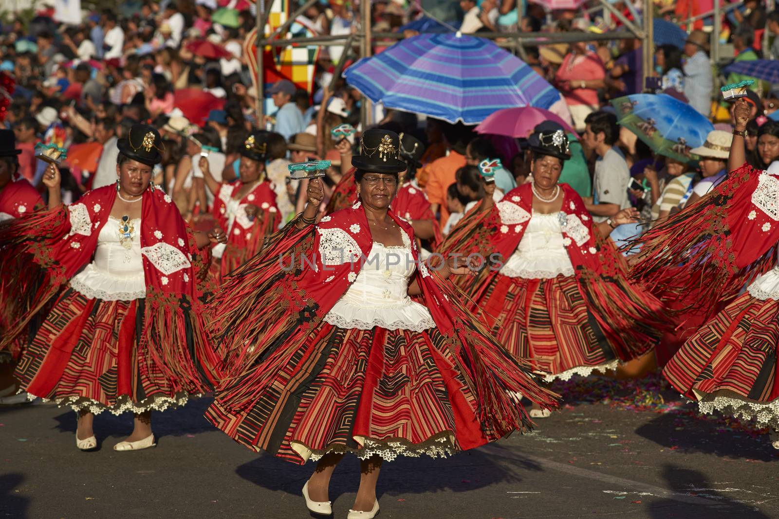 Morenada dancers in traditional Andean costume performing at the annual Carnaval Andino con la Fuerza del Sol in Arica, Chile.