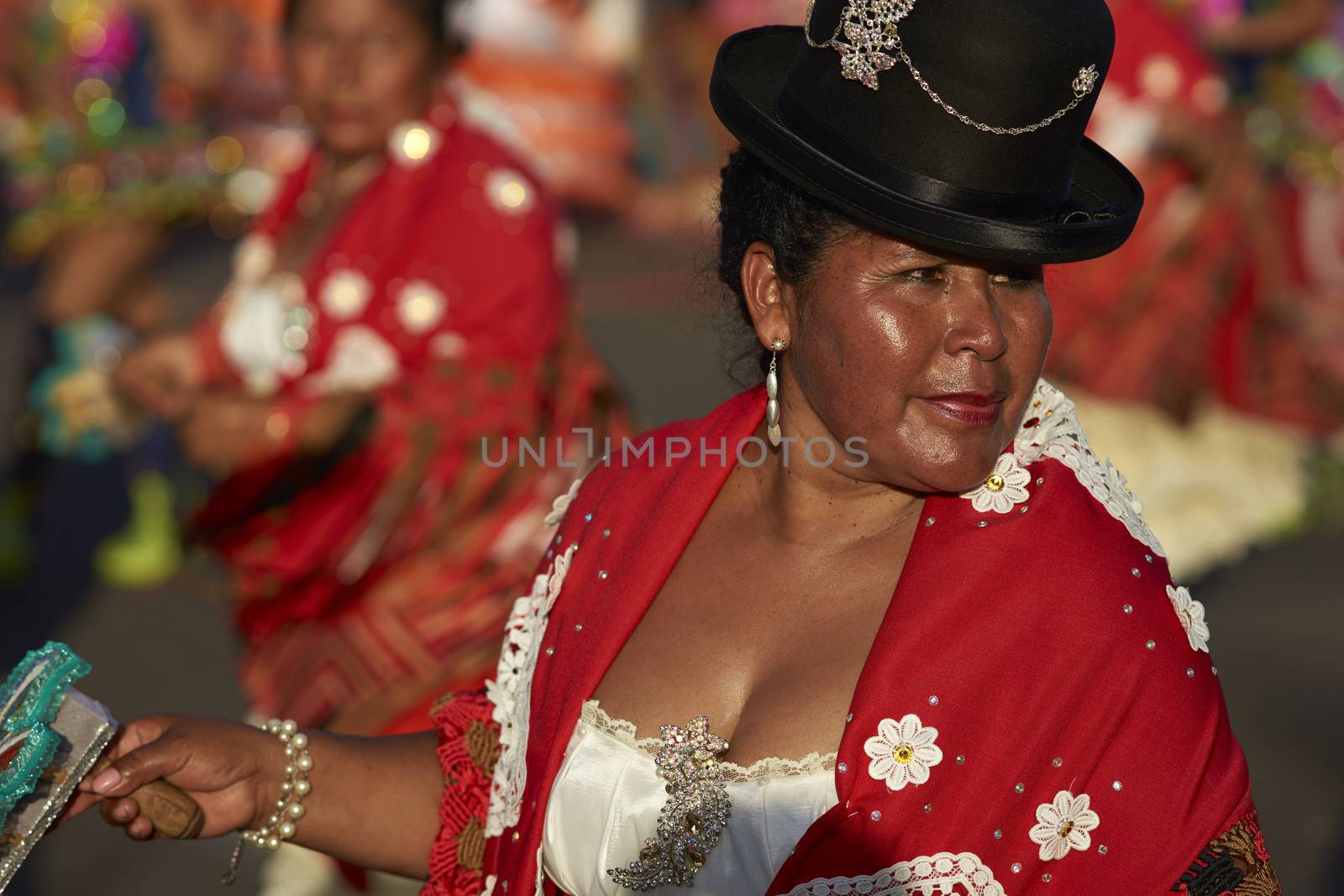 Morenada dancers in traditional Andean costume performing at the annual Carnaval Andino con la Fuerza del Sol in Arica, Chile.
