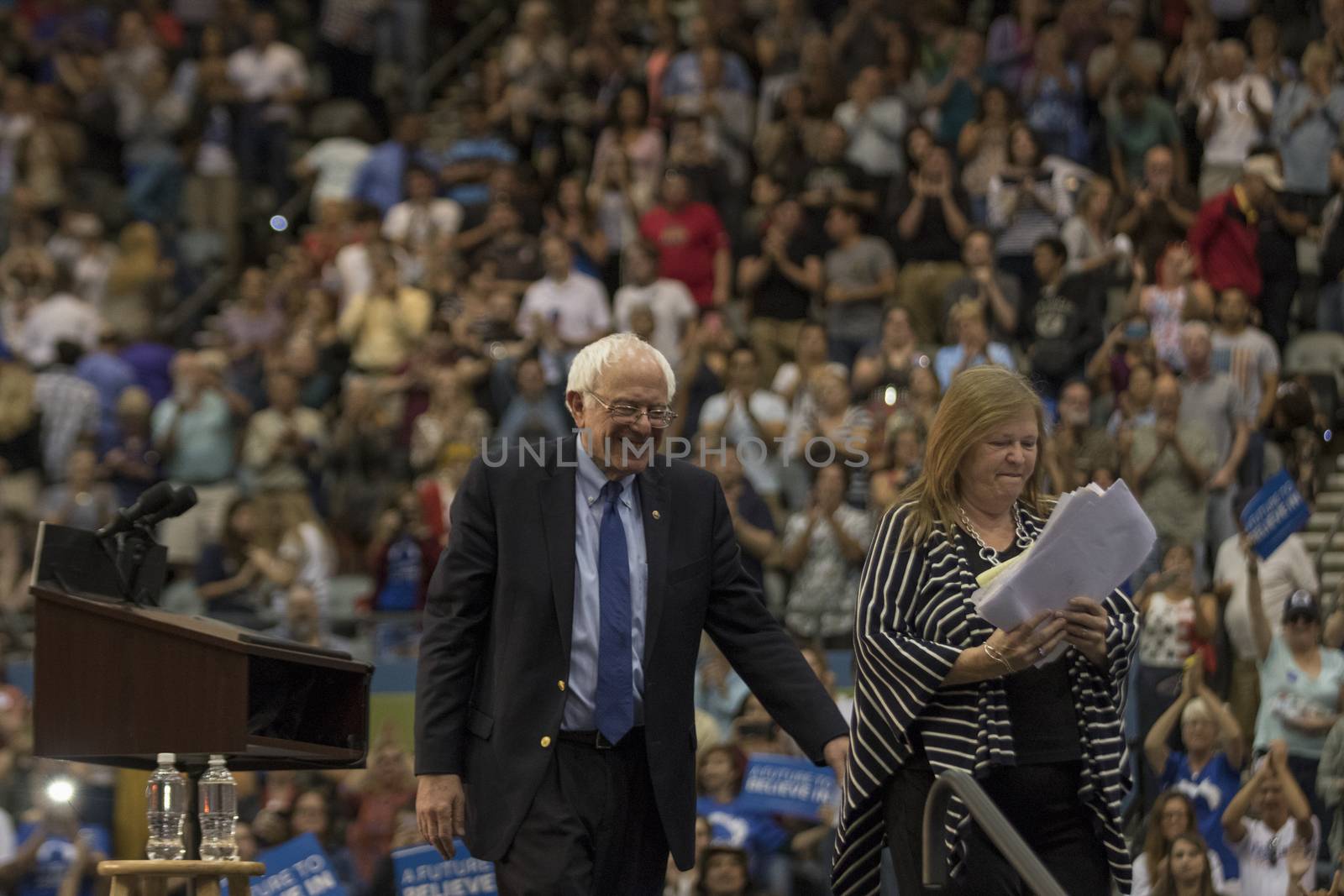 USA, Arizona: U.S. Sen. Bernie Sanders exits the stage with his wife Jane after speaking to a crowd of more than 5,000 at a Future to Believe In rally in Tucson Friday, March 18, 2016.