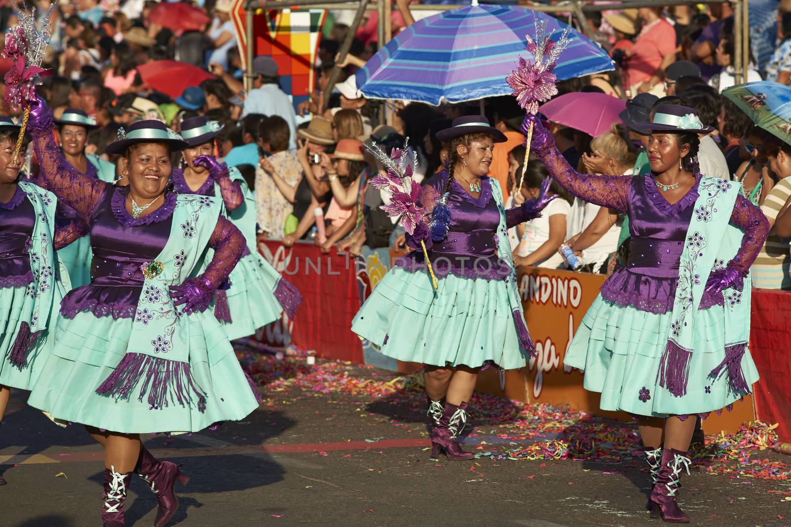 Morenada dancers in traditional Andean costume performing at the annual Carnaval Andino con la Fuerza del Sol in Arica, Chile.