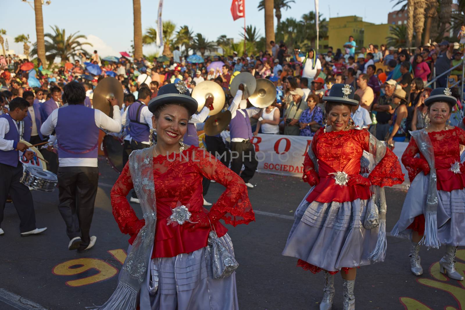 Morenada dancers in traditional Andean costume performing at the annual Carnaval Andino con la Fuerza del Sol in Arica, Chile.