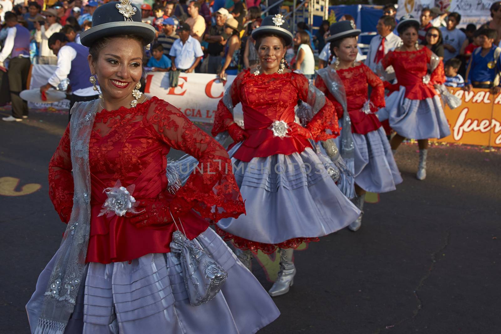 Morenada dancers in traditional Andean costume performing at the annual Carnaval Andino con la Fuerza del Sol in Arica, Chile.