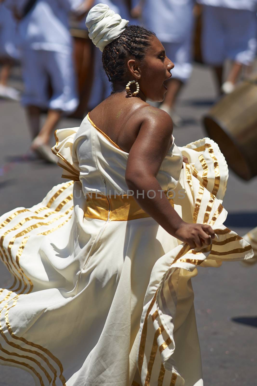 Group of dancers of Africa descent Afrodescendiente performing at the annual Carnaval Andino con la Fuerza del Sol in Arica, Chile.