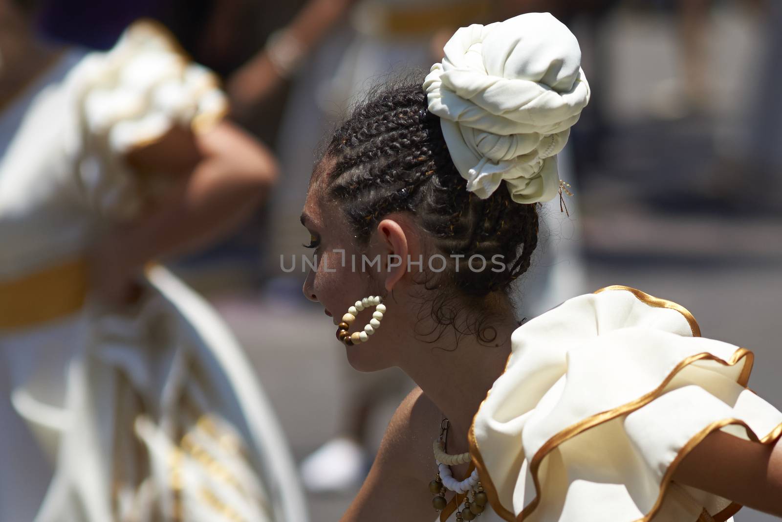 Group of dancers of Africa descent Afrodescendiente performing at the annual Carnaval Andino con la Fuerza del Sol in Arica, Chile.