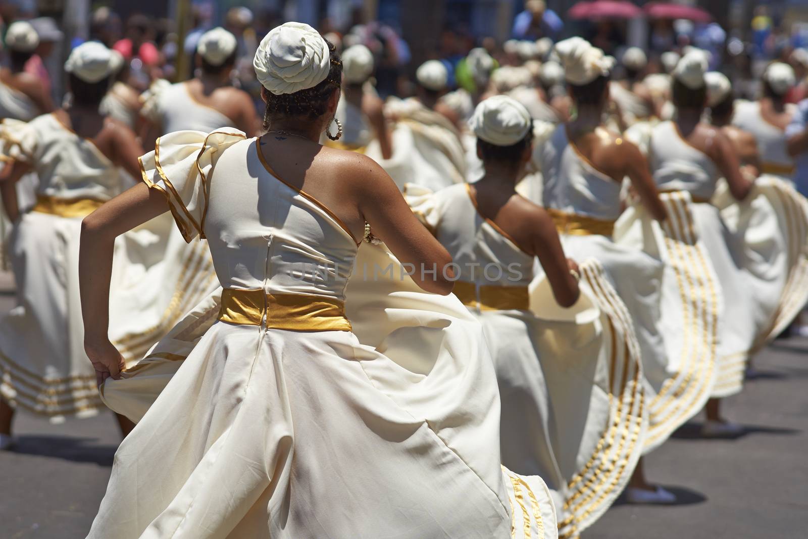 Group of dancers of Africa descent Afrodescendiente performing at the annual Carnaval Andino con la Fuerza del Sol in Arica, Chile.