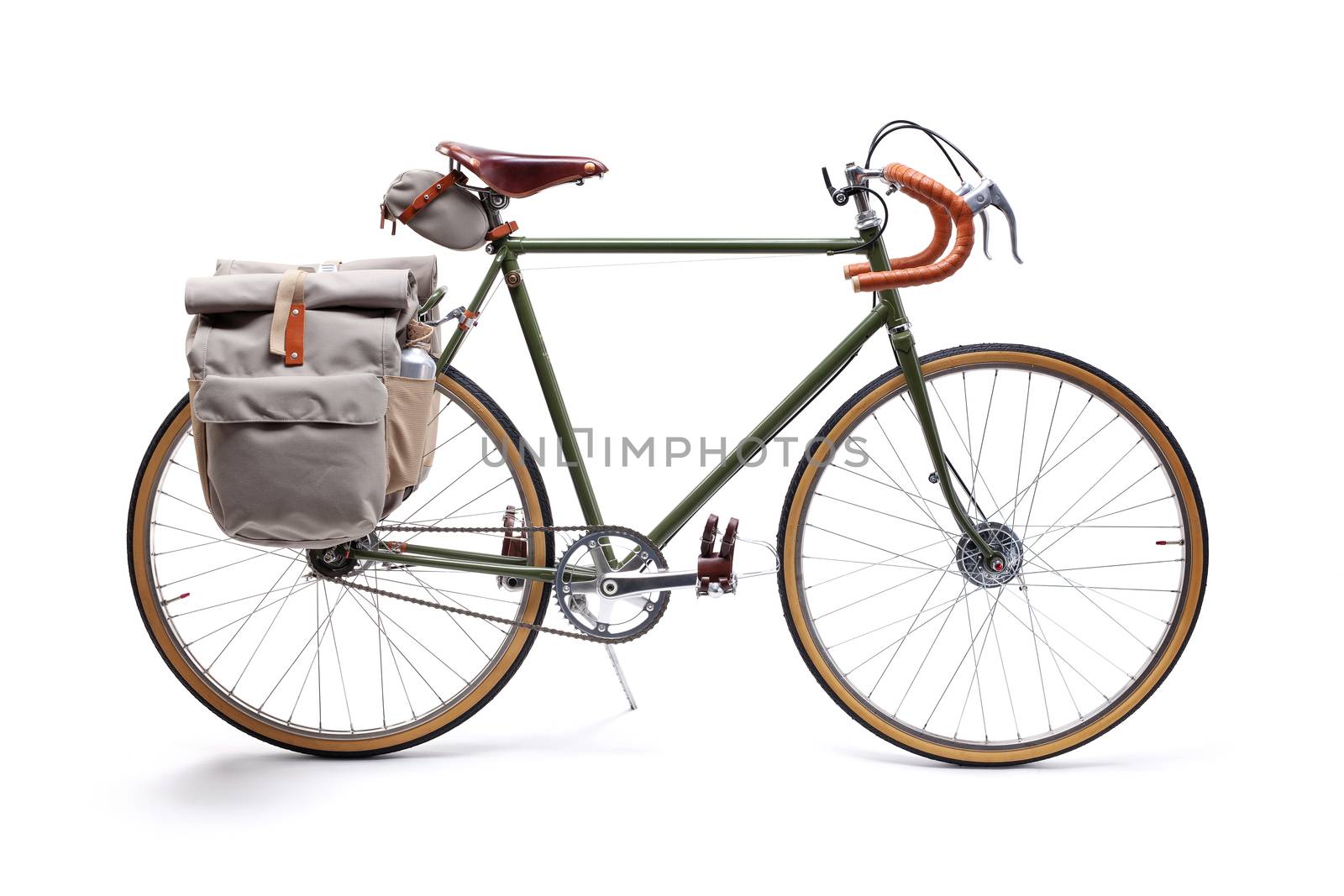 Vintage green road bicycle isolated on white.