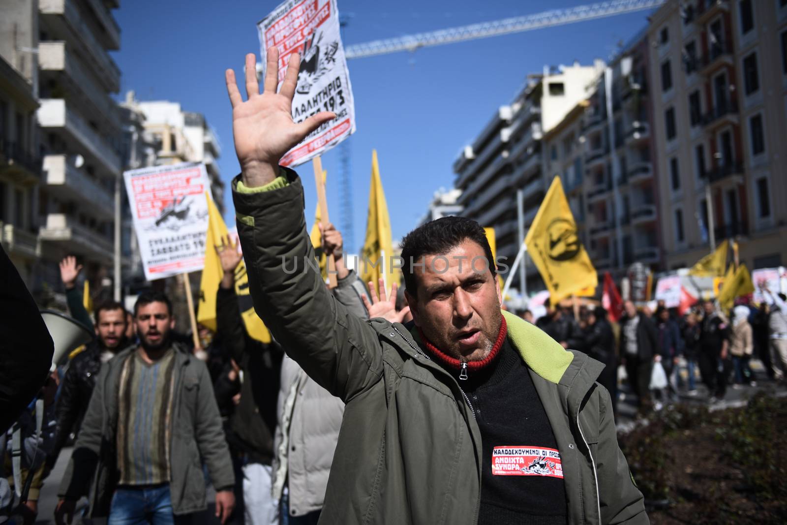 GREECE, Thessaloniki: Hundreds of migrants from Diavata refugees camp and Greek citizens demonstrate in Thessaloniki, northern Greece, against the EU migration policy and closed borders, on March 19, 2016.