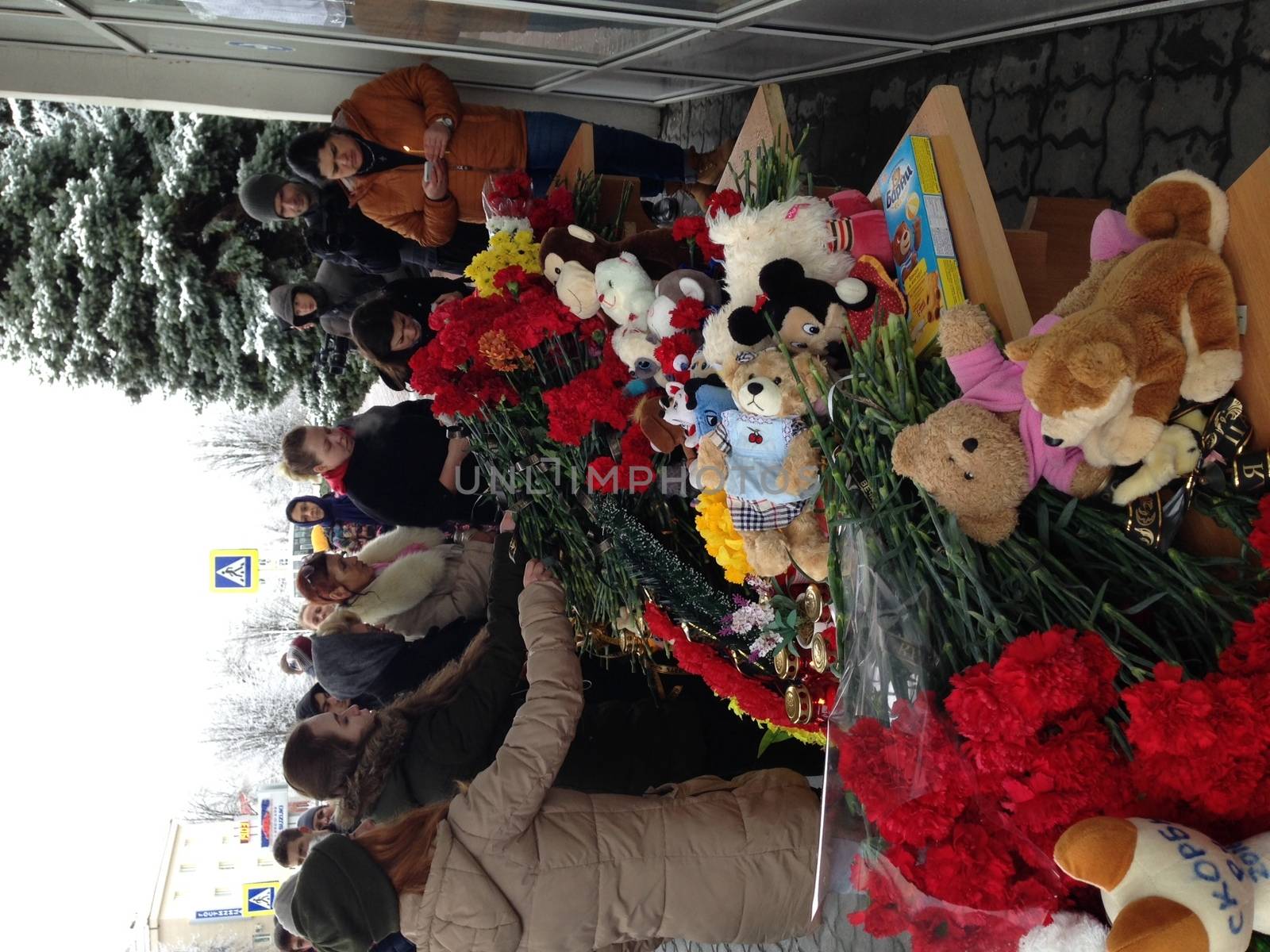 RUSSIA, Rostov-on-Don : People lay flowers at the airport entrance in Rostov-on-Don on March 19, 2016.A flydubai passenger jet crashed in southern Russia early Saturday, killing all 62 people on board as it tried to land in bad weather in the city of Rostov-on-Don, officials said. The Boeing 737, heading from Dubai to the southern Russian city, was reportedly making its second attempt to land at 0050 GMT when it missed the runway, erupting in a huge fireball as it crashed, leaving debris scattered across a wide area.